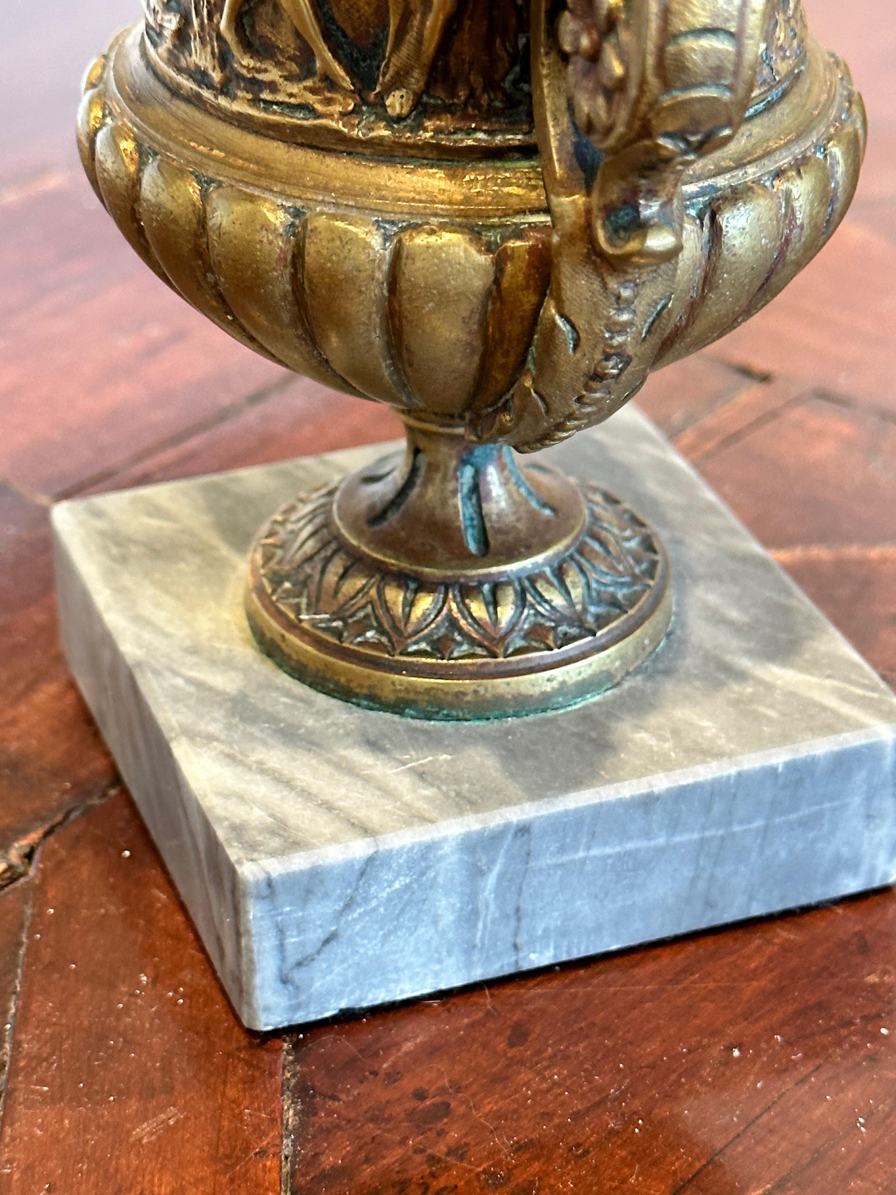 Nice quality, small urn with marble base
