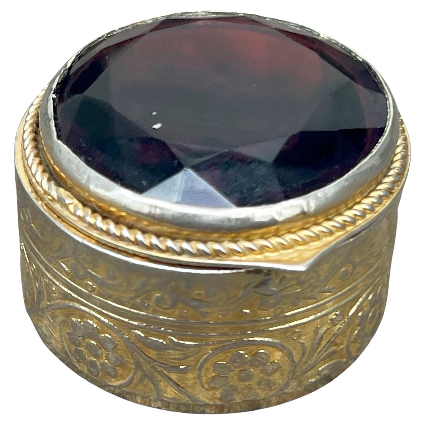 Late 19th Century Gilt Metal Pill Box with Beveled Burgundy Glass Top