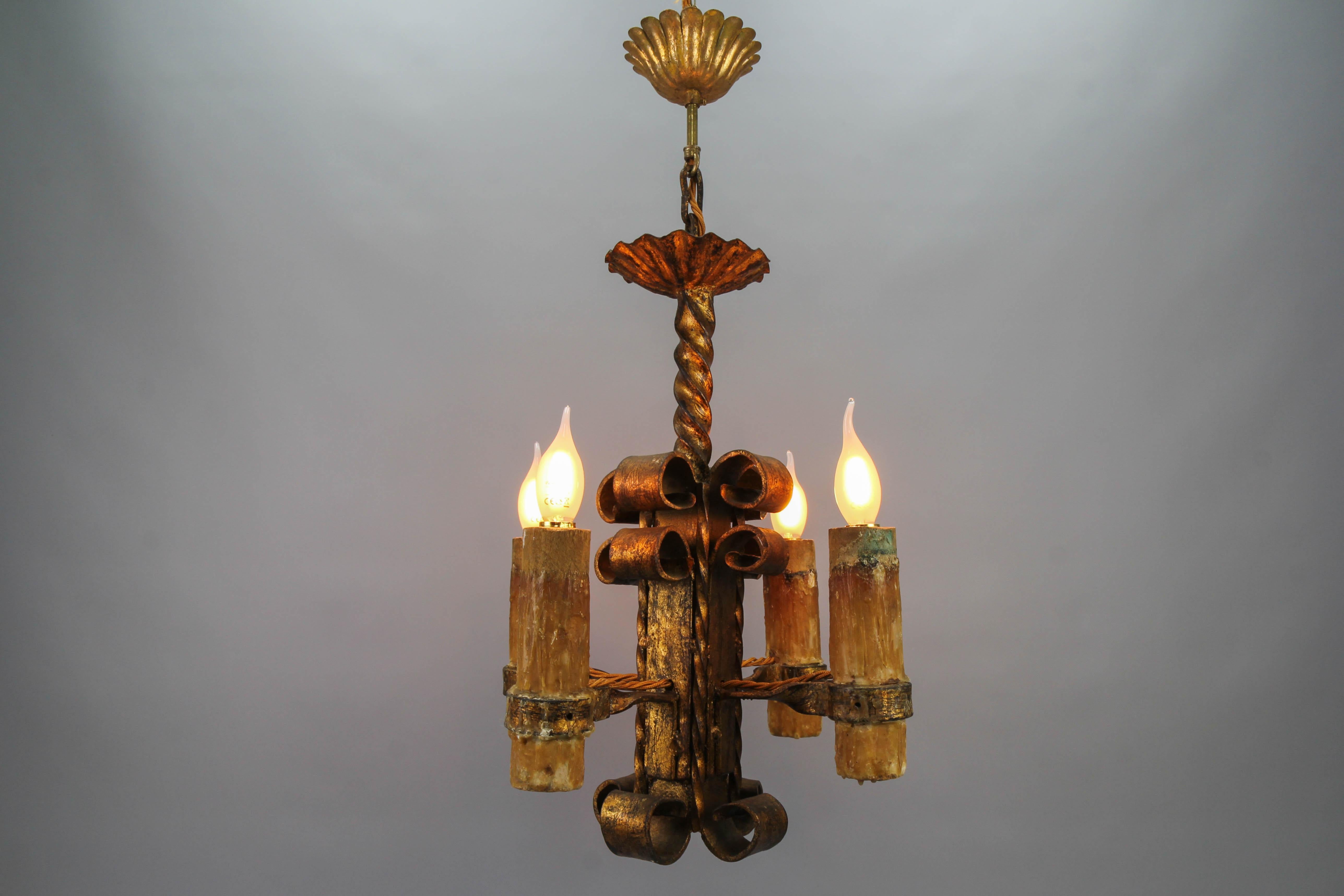 French Late 19th Century Gilt Wrought Iron Medieval Style Four-Light Chandelier For Sale