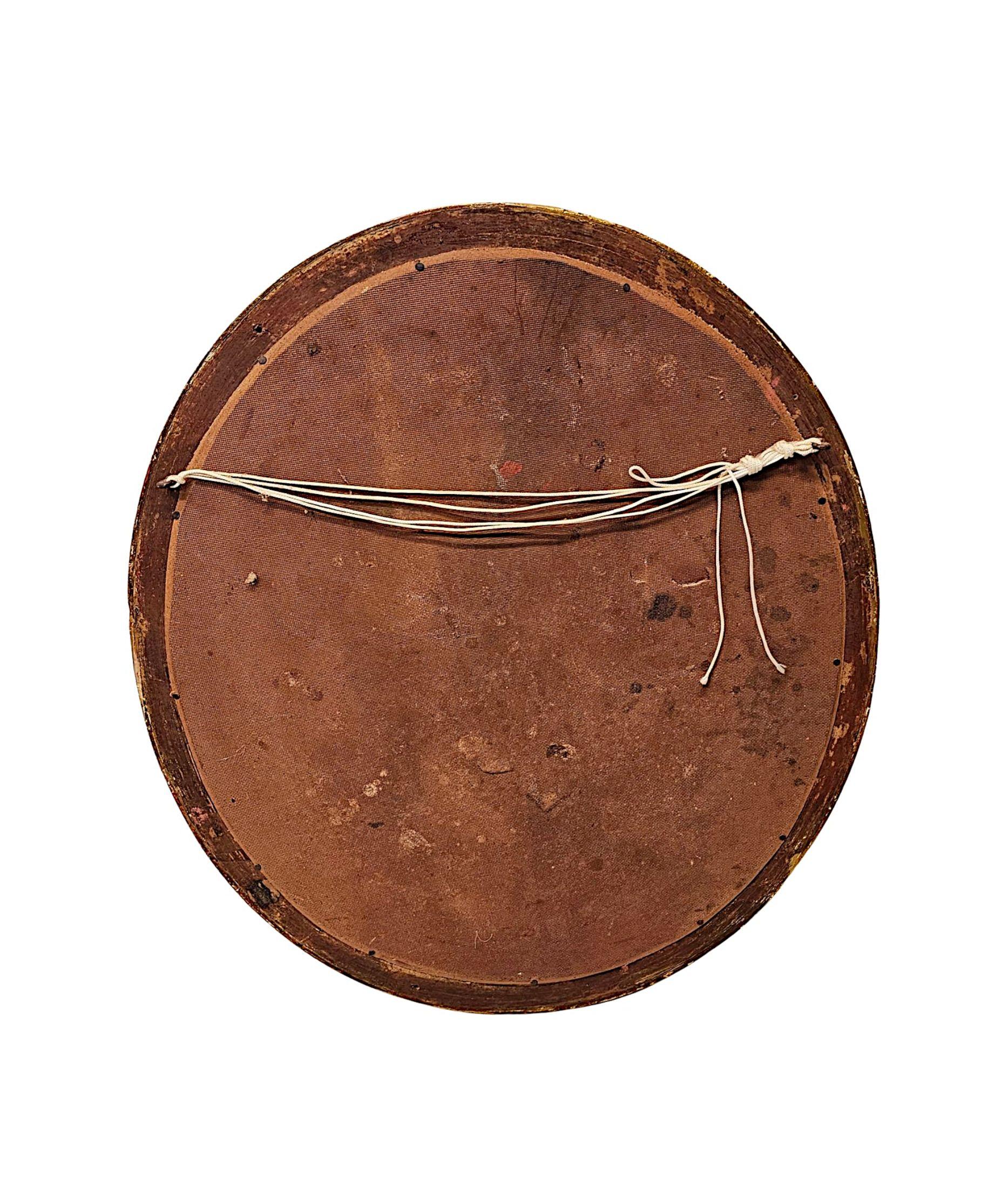 Miroir ovale en bois doré de la fin du XIXe siècle en vente 1