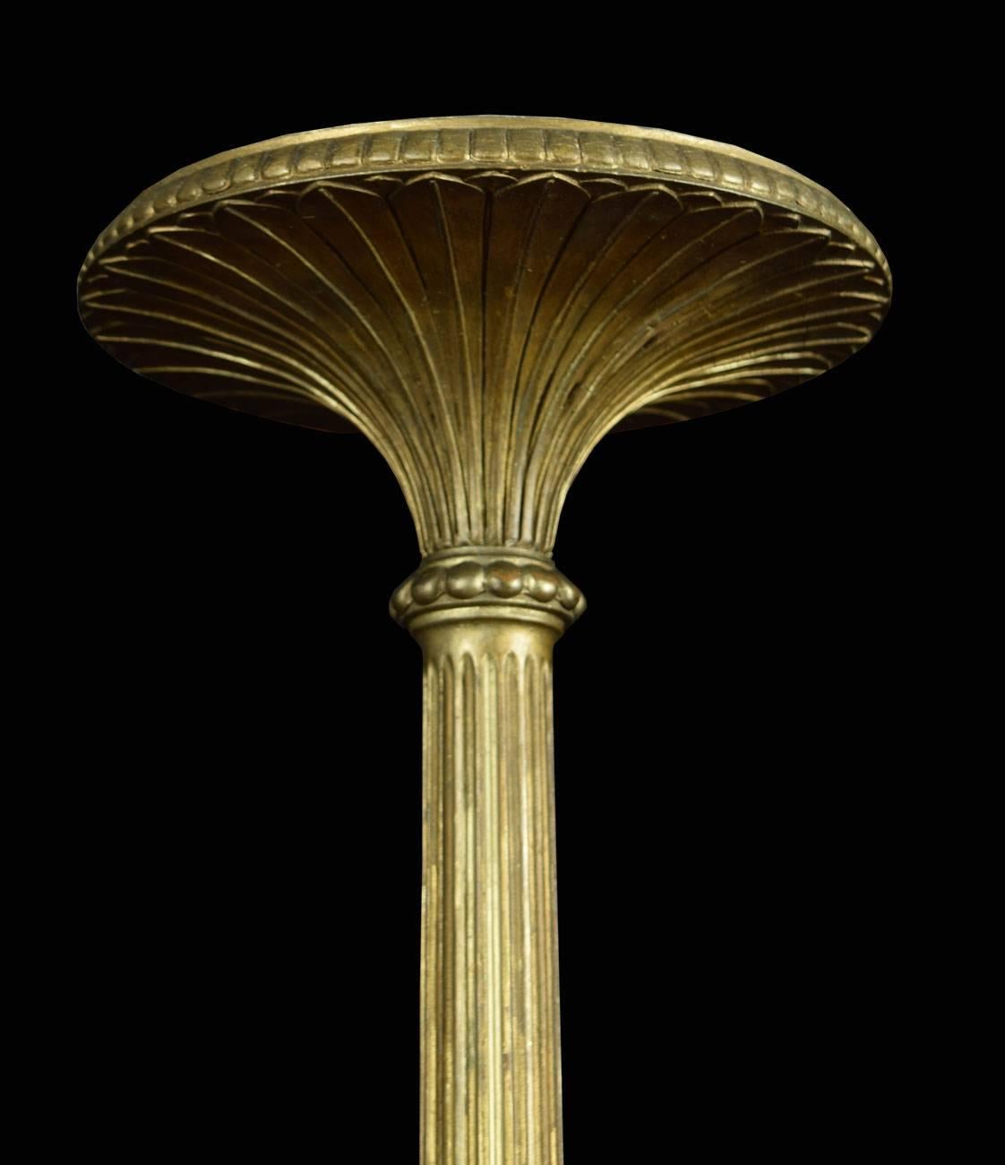 Late 19th qcentury giltwood torchere with circular top above the fluted reeded column and acanthus clad circular base with square plinth.

Dimensions:

Height: 56 inches.

Diameter of top: 11 inches.