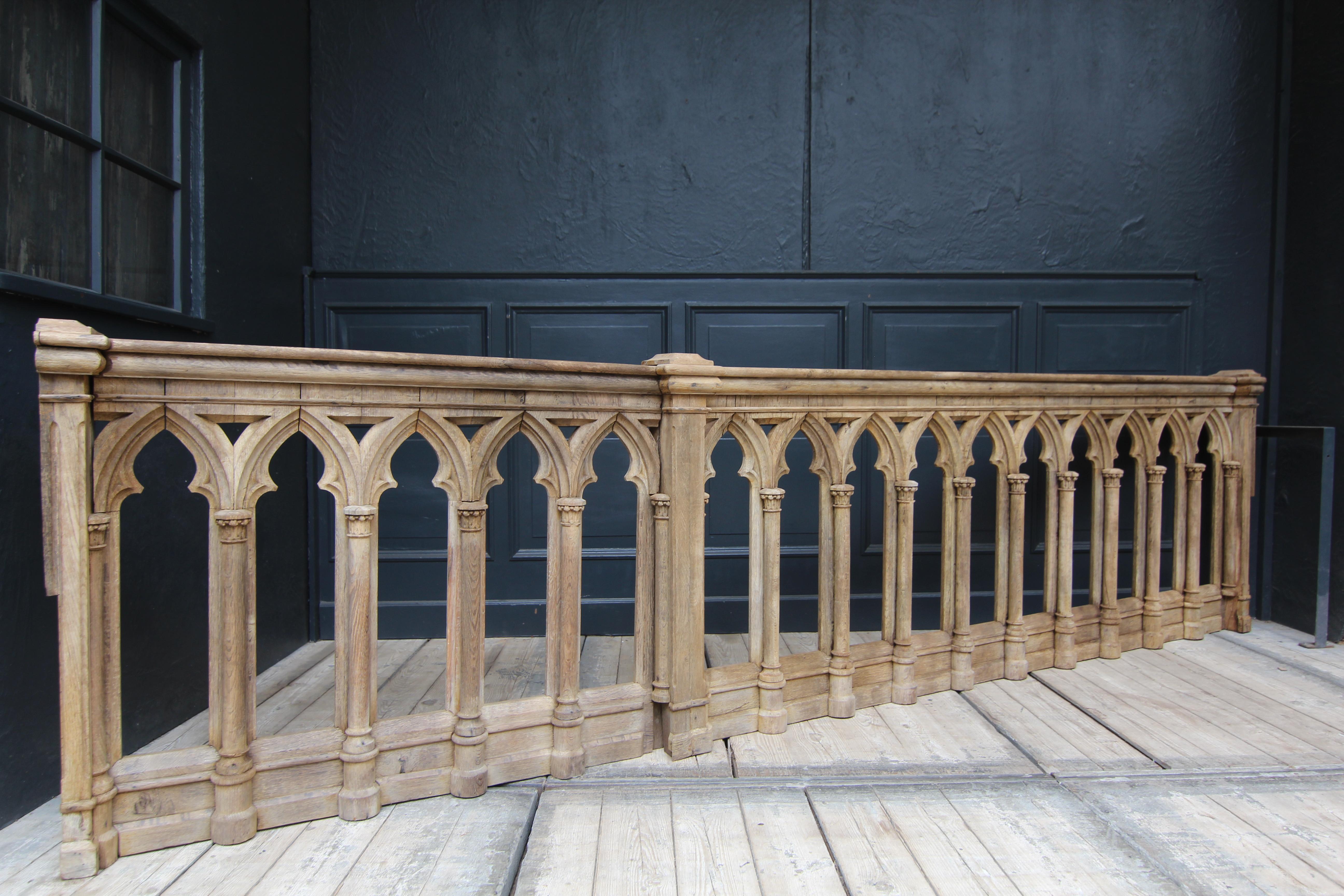 A late 19th century Gothic-Revival balustrade made and carved of solid oak wood.
In the form of Gothic blind tracery or arcades and fronting round columns with highly simplified small Corinthian capitals.

The balustrade comes from a courtroom.