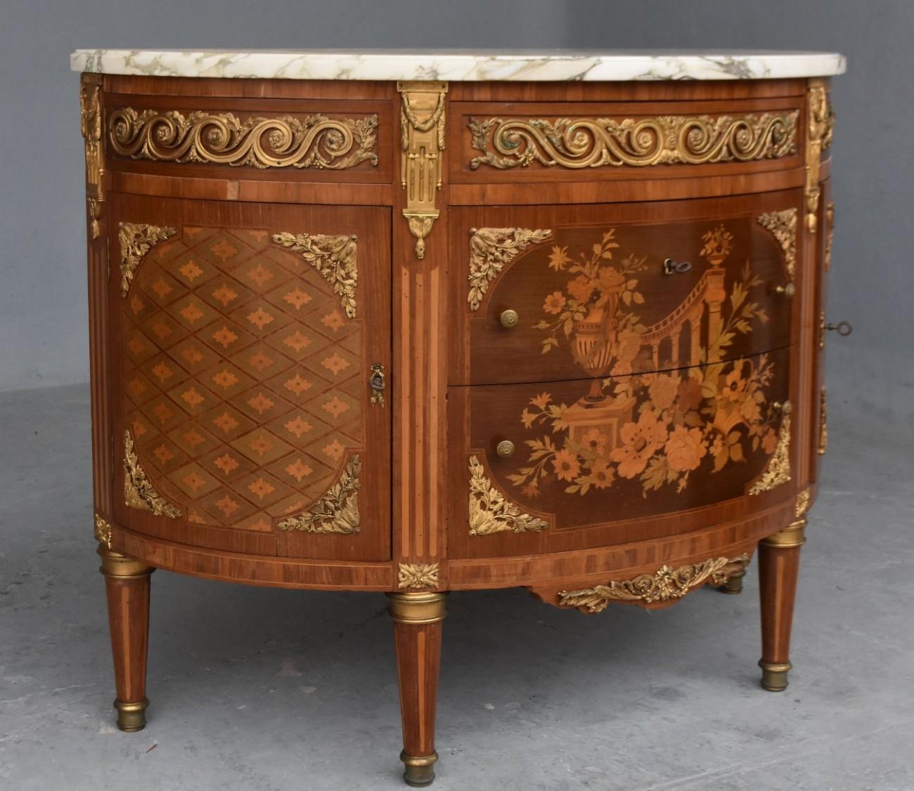 Half-moon doors inlaid commode Louis XVI late 19th century, rich gilded bronze trim, beautiful floral and architectural inlay, oak mounting.