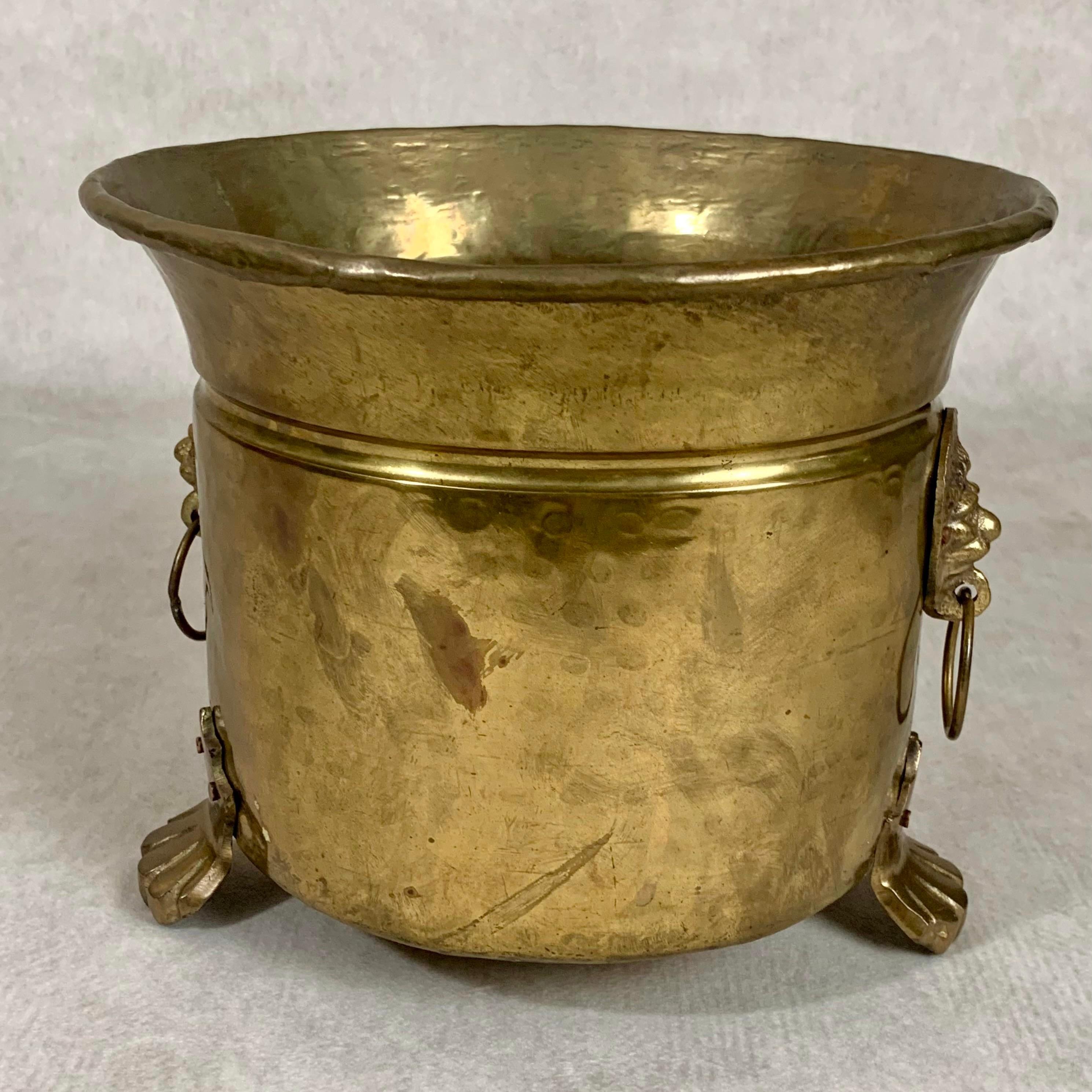 Late 19th Century Hammered Brass Lion Head Jardiniere In Good Condition For Sale In Middletown, MD