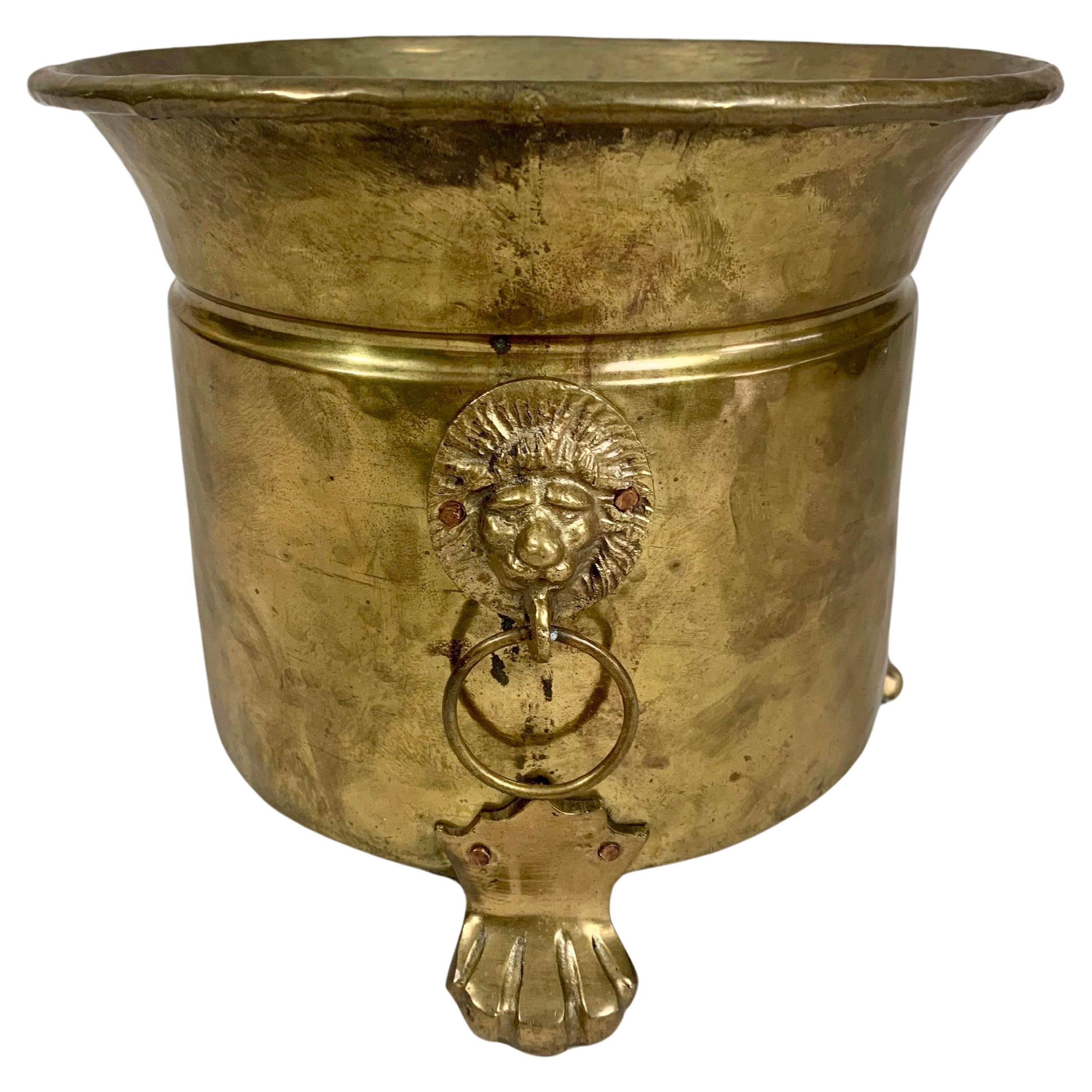 Late 19th Century Hammered Brass Lion Head Jardiniere For Sale