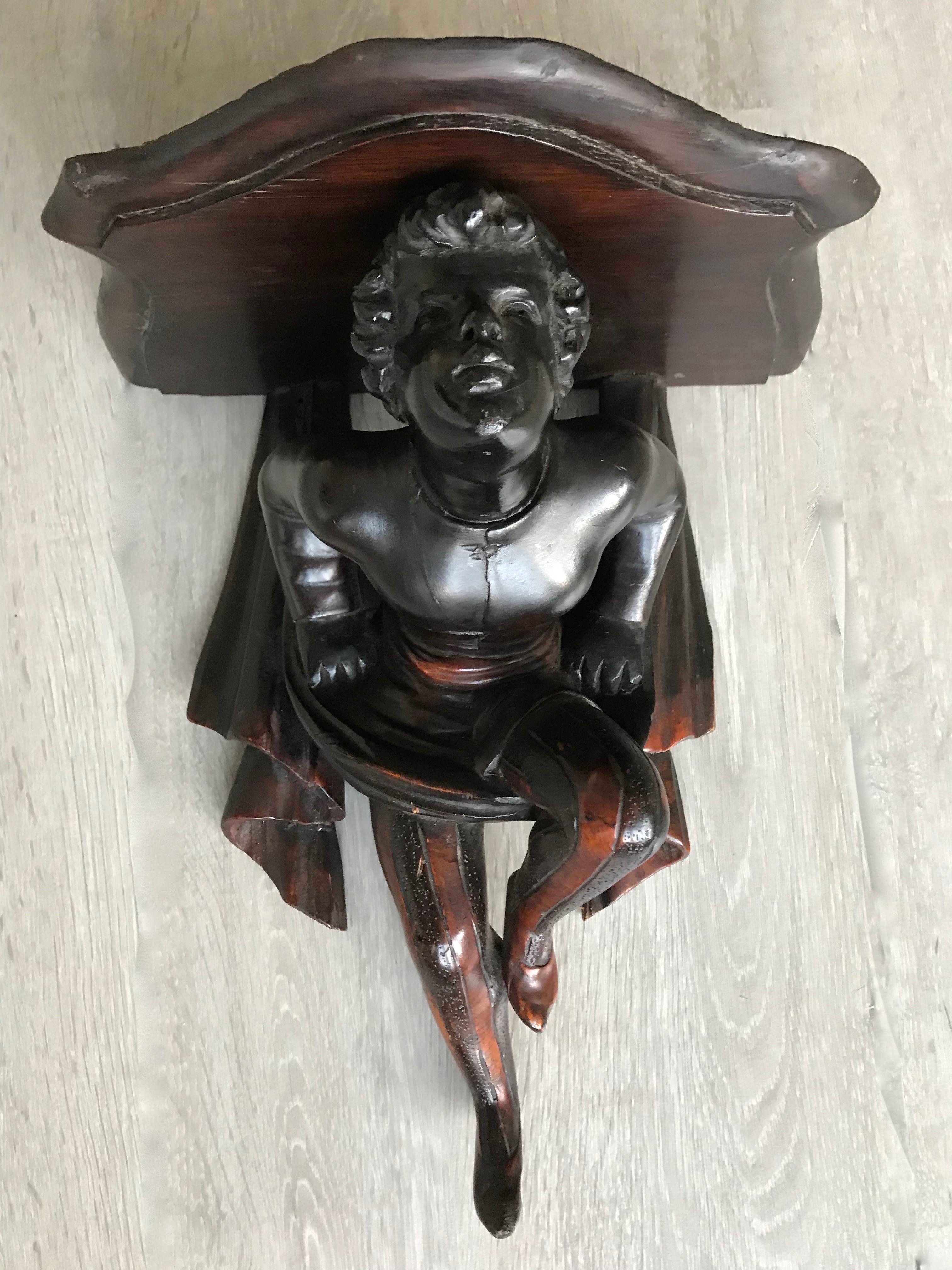 Hand-Carved Late 19th Century Hand Carved and Ebonized Venetian Boy Sculpture Wall Bracket