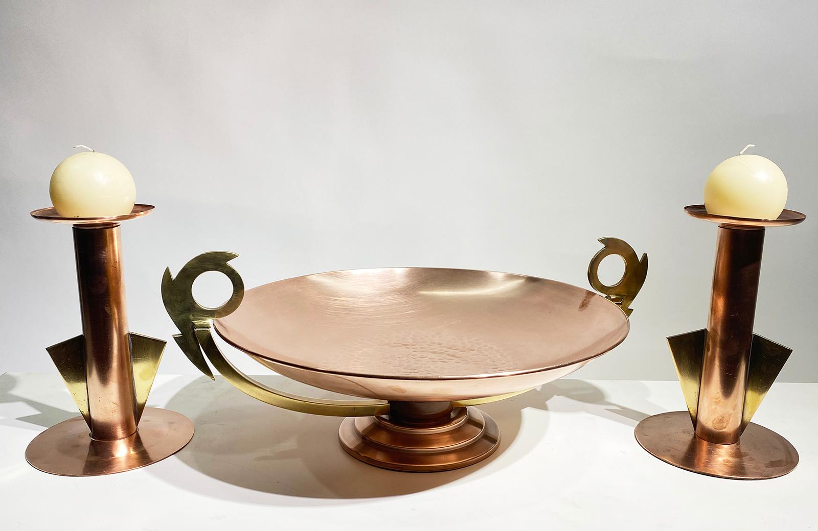 This beautiful late 19th century brass set features a hand-hammered tray with two candle holders
The tray is stamped on the bottom and marked Villedieu, short for Villedieu-les-Poeles, a town in Normandy considered the copper capital of France. c.