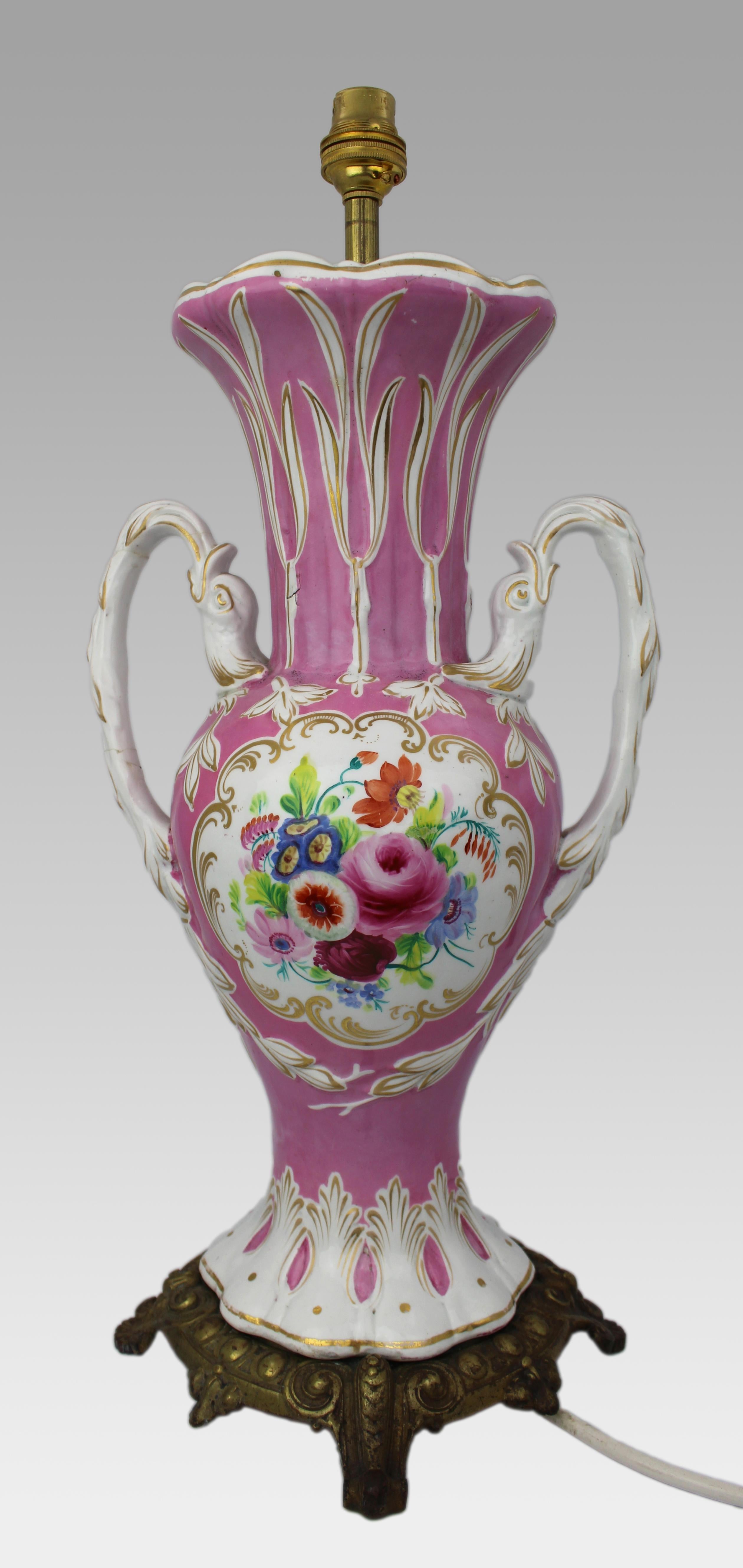 Late 19th Century Hand Painted Porcelain Table Lamp with Brass Base, circa 1890

An attractive antique porcelain table lamp of classical vase form, dating to the late 19th century.

The finely moulded porcelain body features twin swan-neck handles