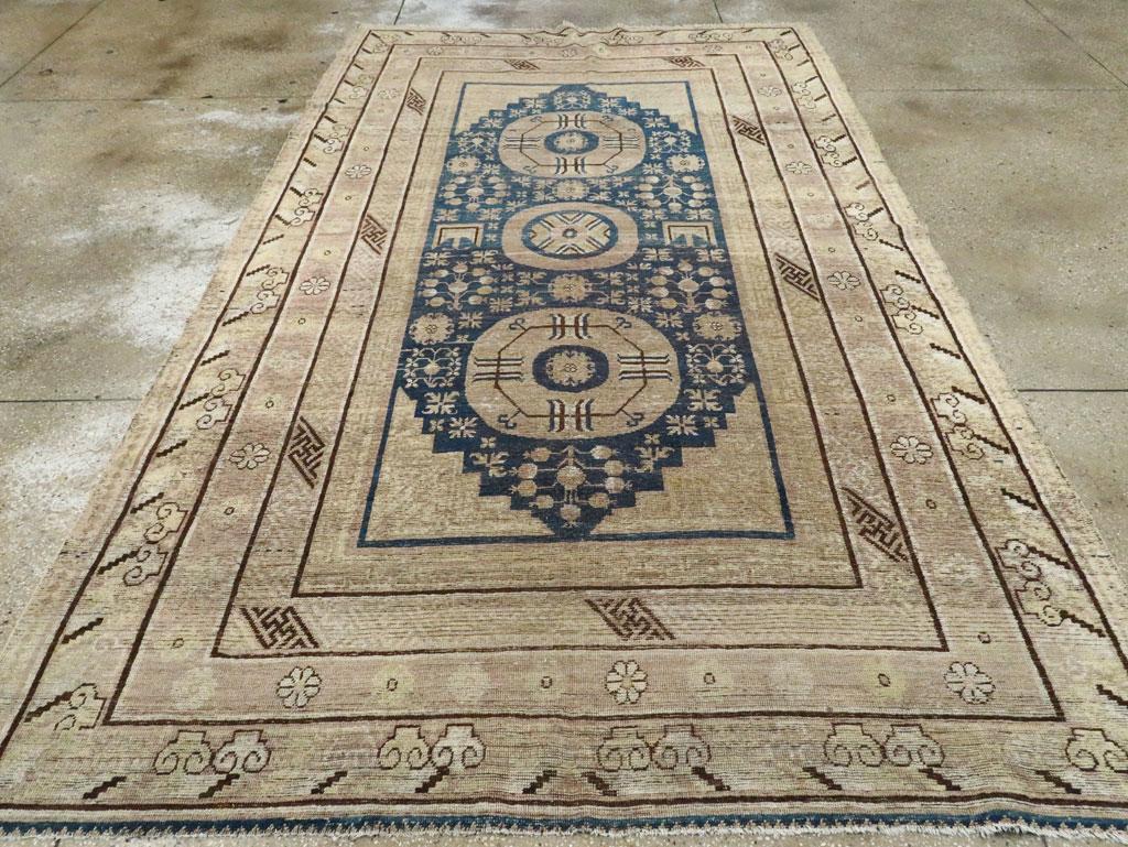 East Turkestani Late 19th Century Handmade East Turkestan Khotan Gallery Carpet For Sale