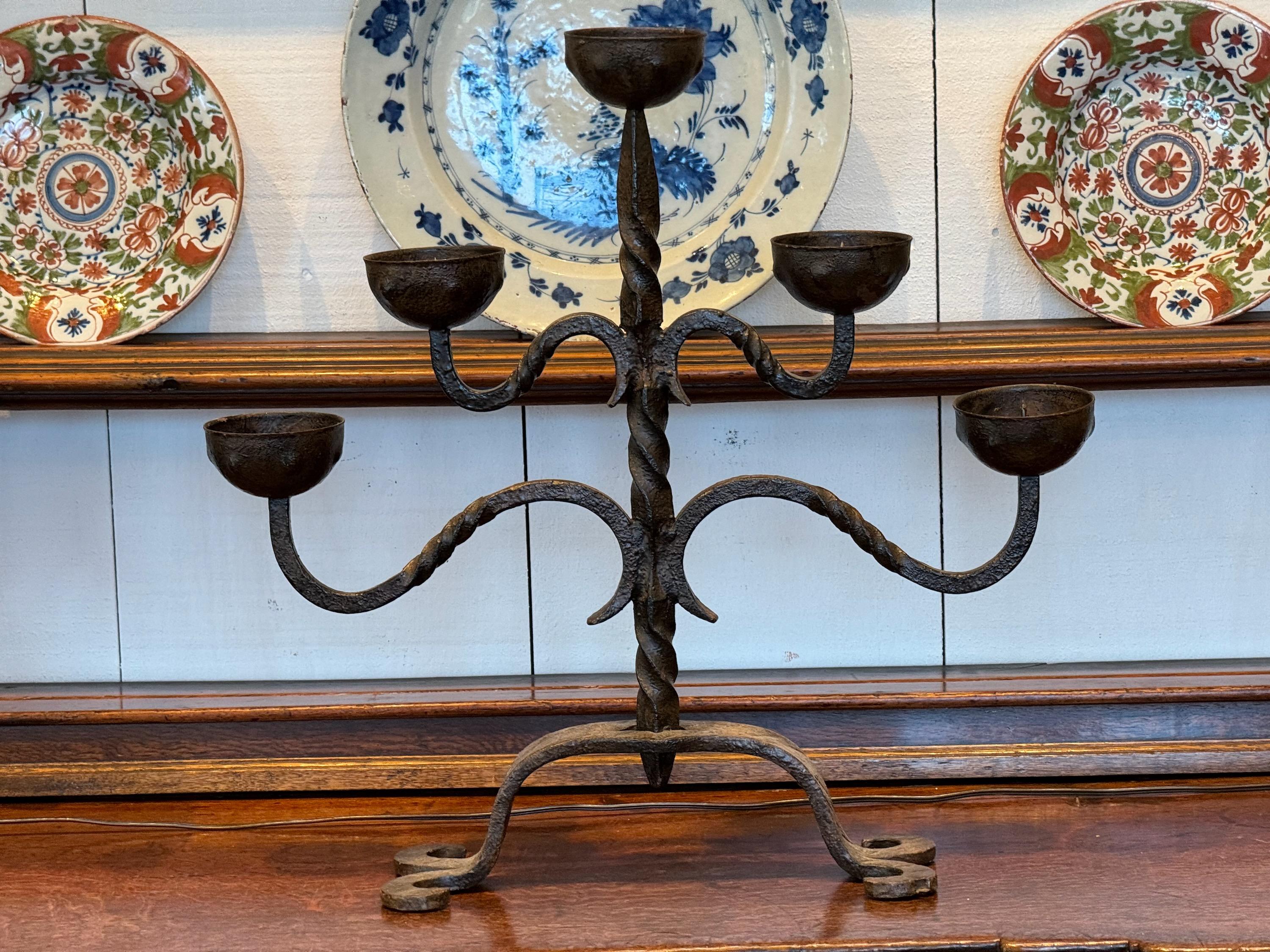 A hand wrought iron candle stand. Great scale. Made in the Late 19th Century.