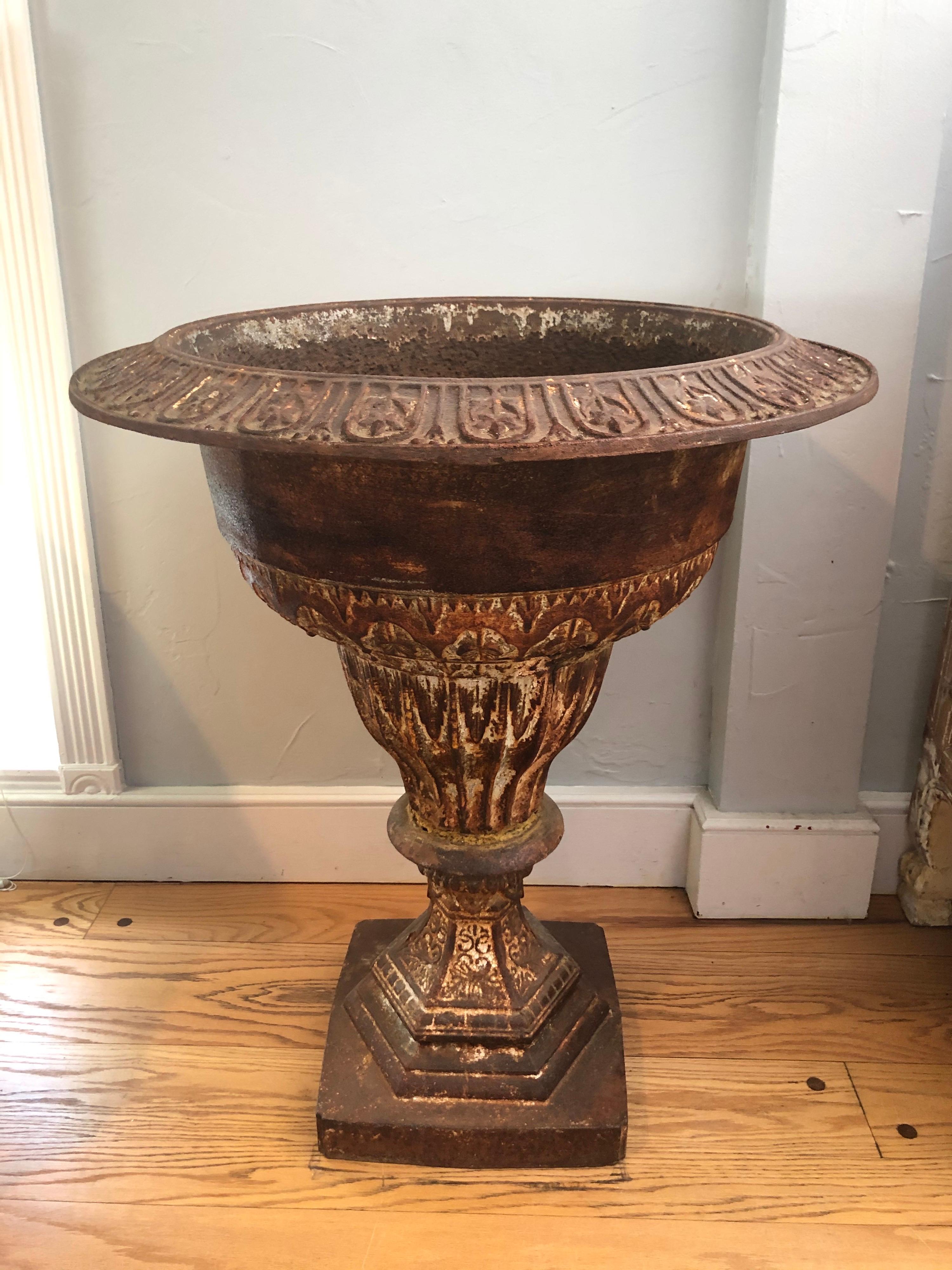 Late 19th century garden urn. This beautiful piece is most likely produced by J. W. Fiske and Company although a signature cannot be found. This incredible detailed Victorian piece can be used in or outdoors. The date is stamped on the side and we