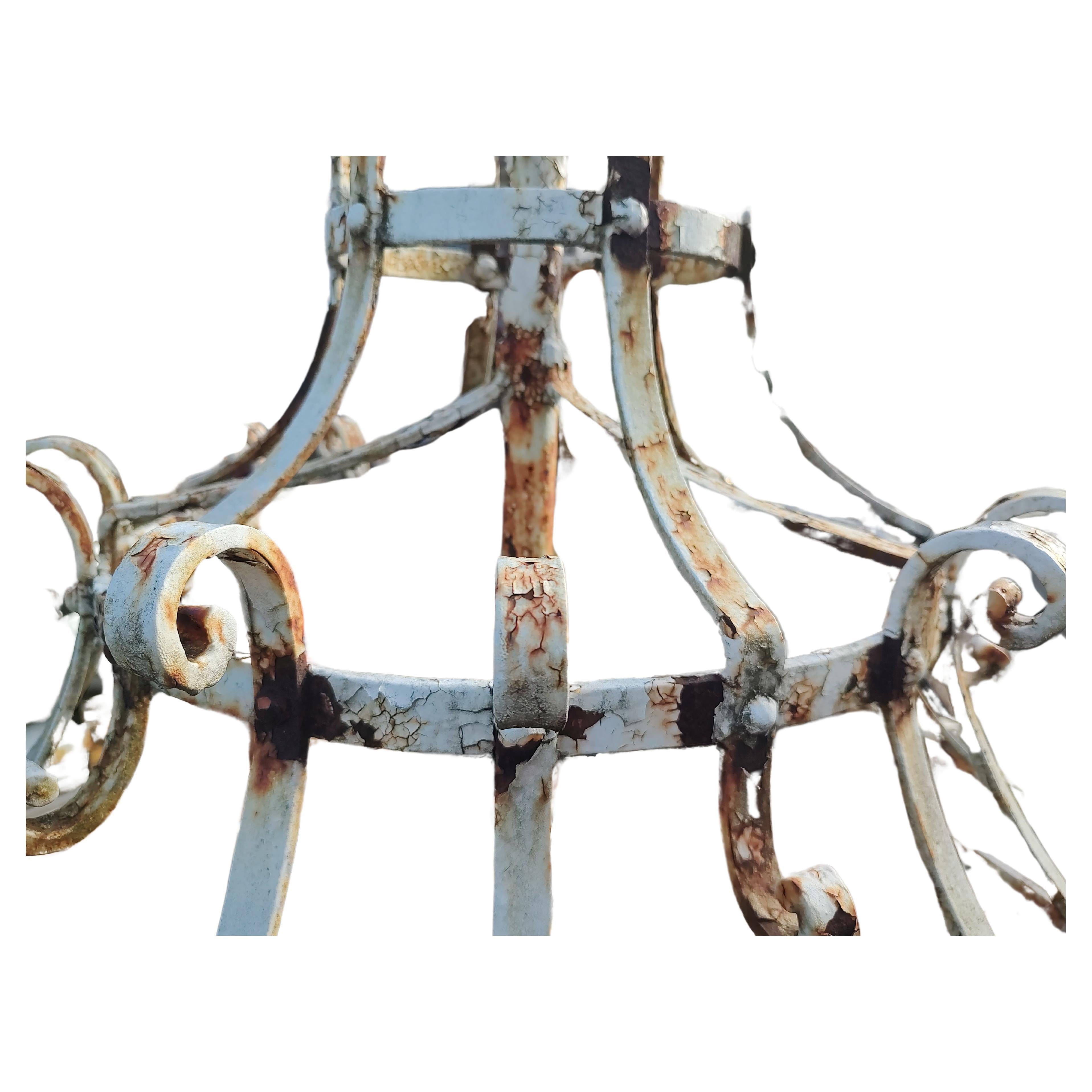 Fantastic well head in heavy gauge iron from the Victorian period. Beautiful scrollwork from top to bottom with a sparrow perched on the center spire. 
Dress up your well with a absolutely gorgeous piece of American style and function. In excellent
