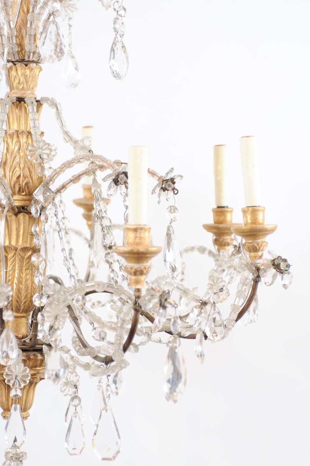 Bois doré Fin du 19e siècle, lustre italien en bois doré et cristal à 8 Lights en vente