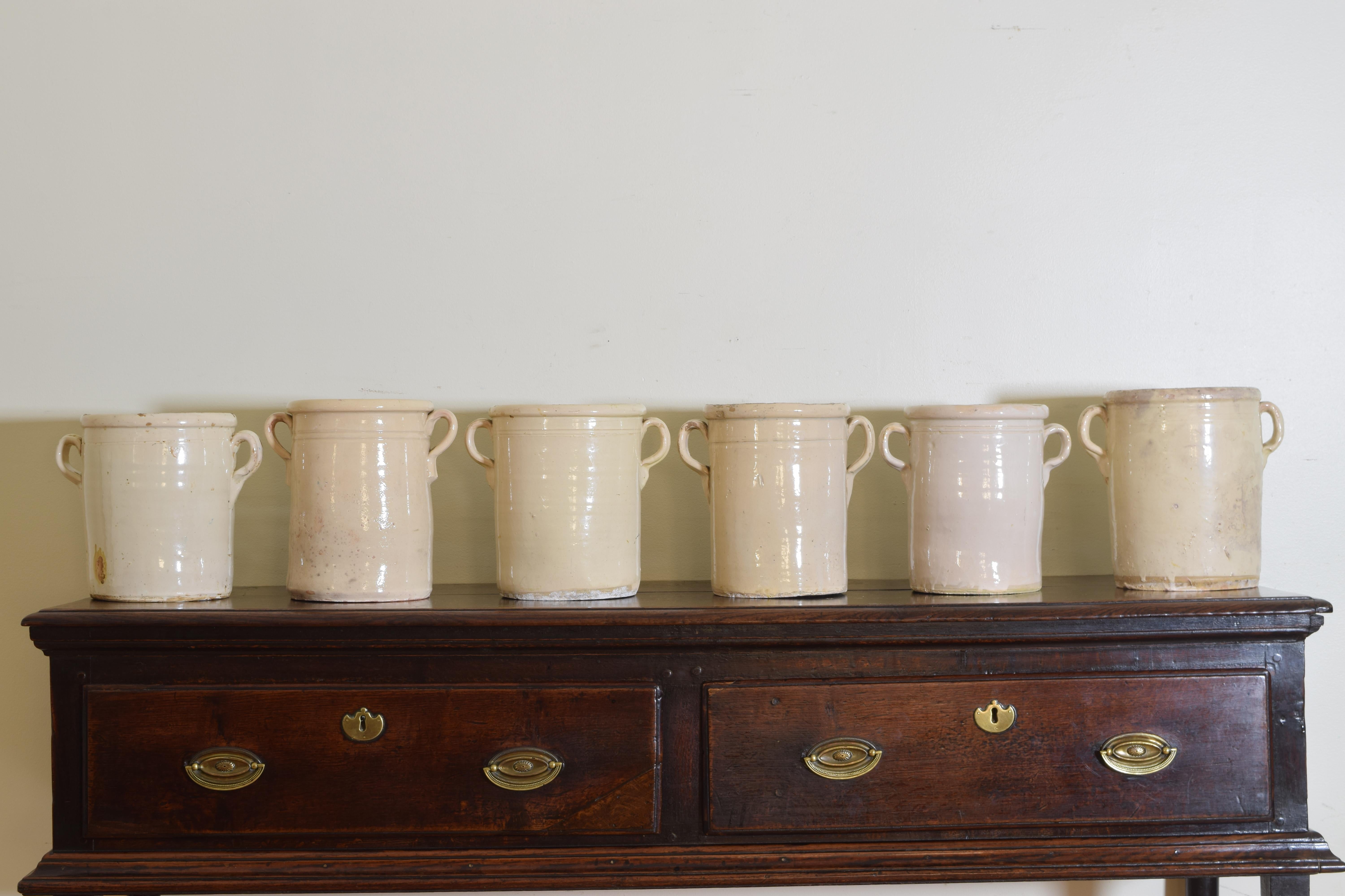 19th century Italian confit pot or jar. Handcrafted and painted with two shaped handles, known as 'ears.' These jars were used for storing and preserving cooked meat popular in Southern Italy.