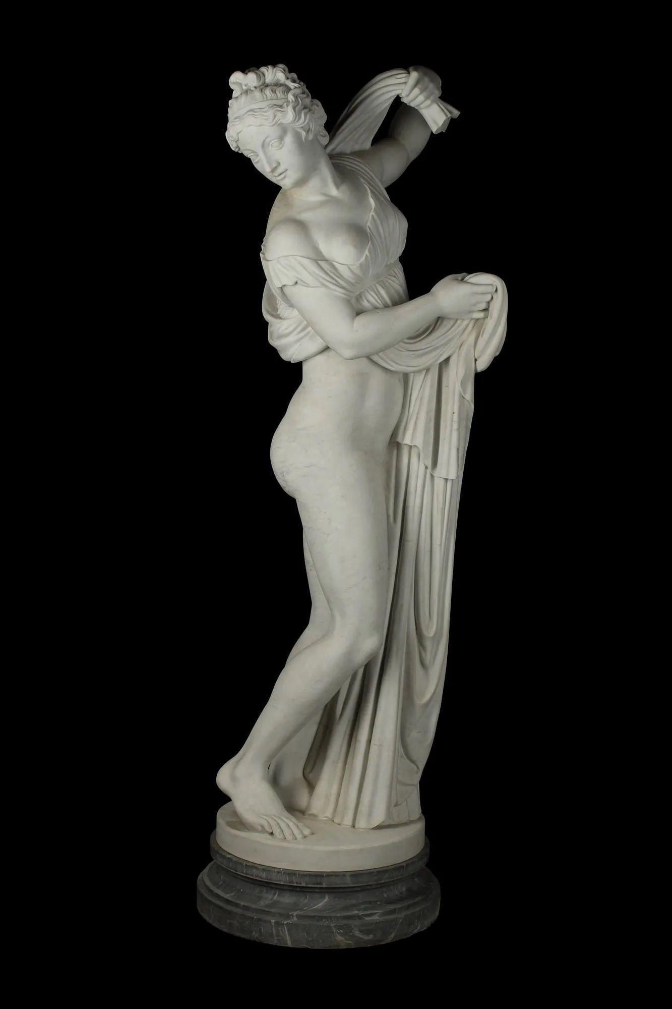Traditional life-size marble figure depicting an alluring semi-nude woman holding a draped garment that appears to be a dress. Made in Italy in the Late 19th Century.
Dimensions:
72