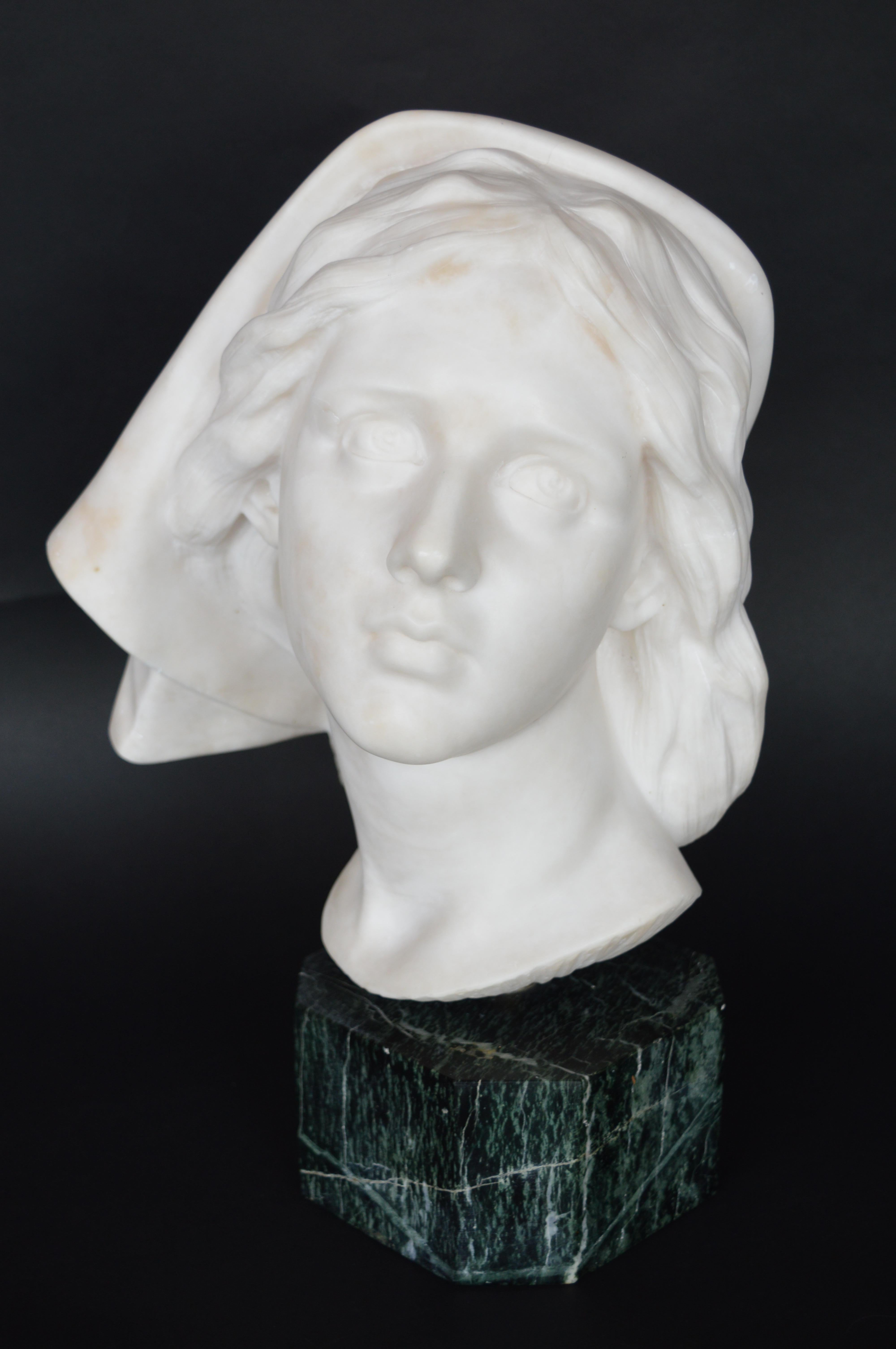 Carrara marble bust of a young girl.