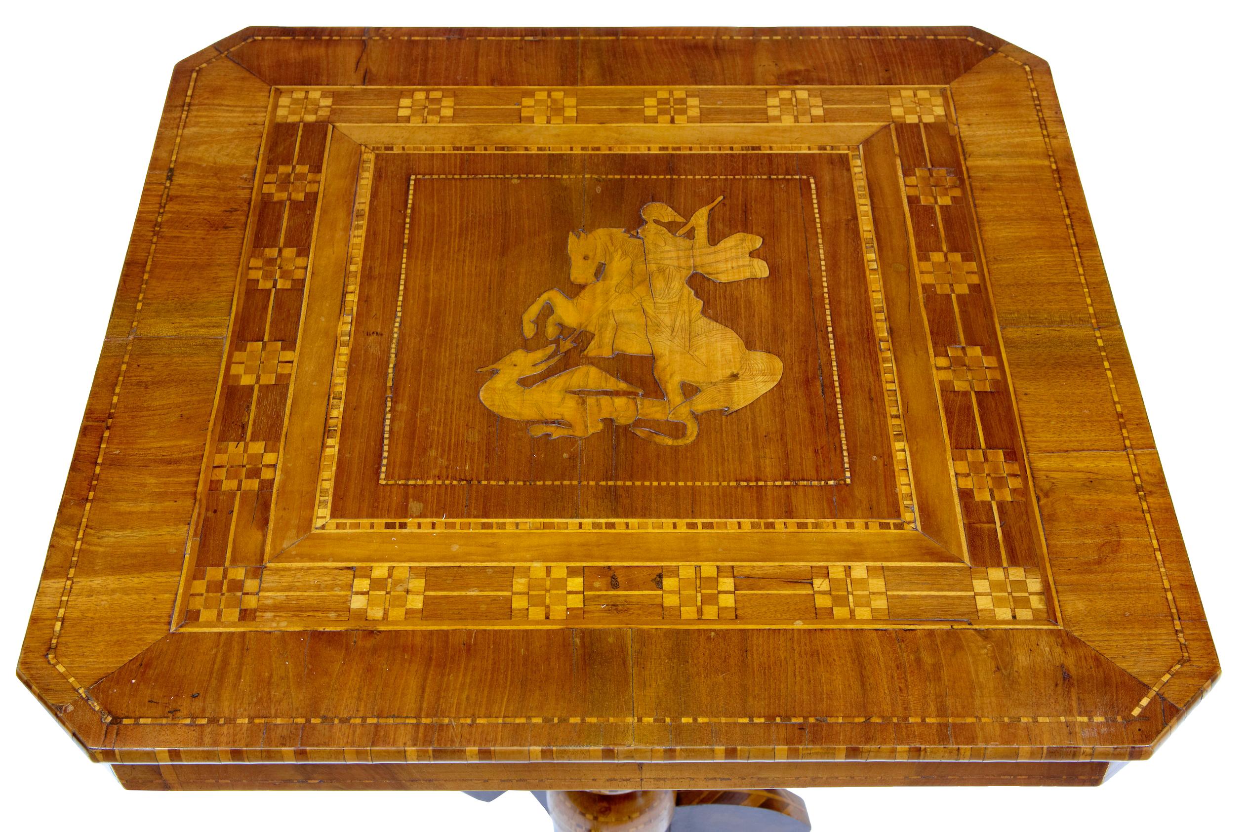 Late 19th century italian walnut sorrento occasional table, circa 1880.

Profusely inlaid italian sorrento table in walnut and olive wood. Square top with canted corners, the top flows with a geometric pattern and depicts george and the dragon in