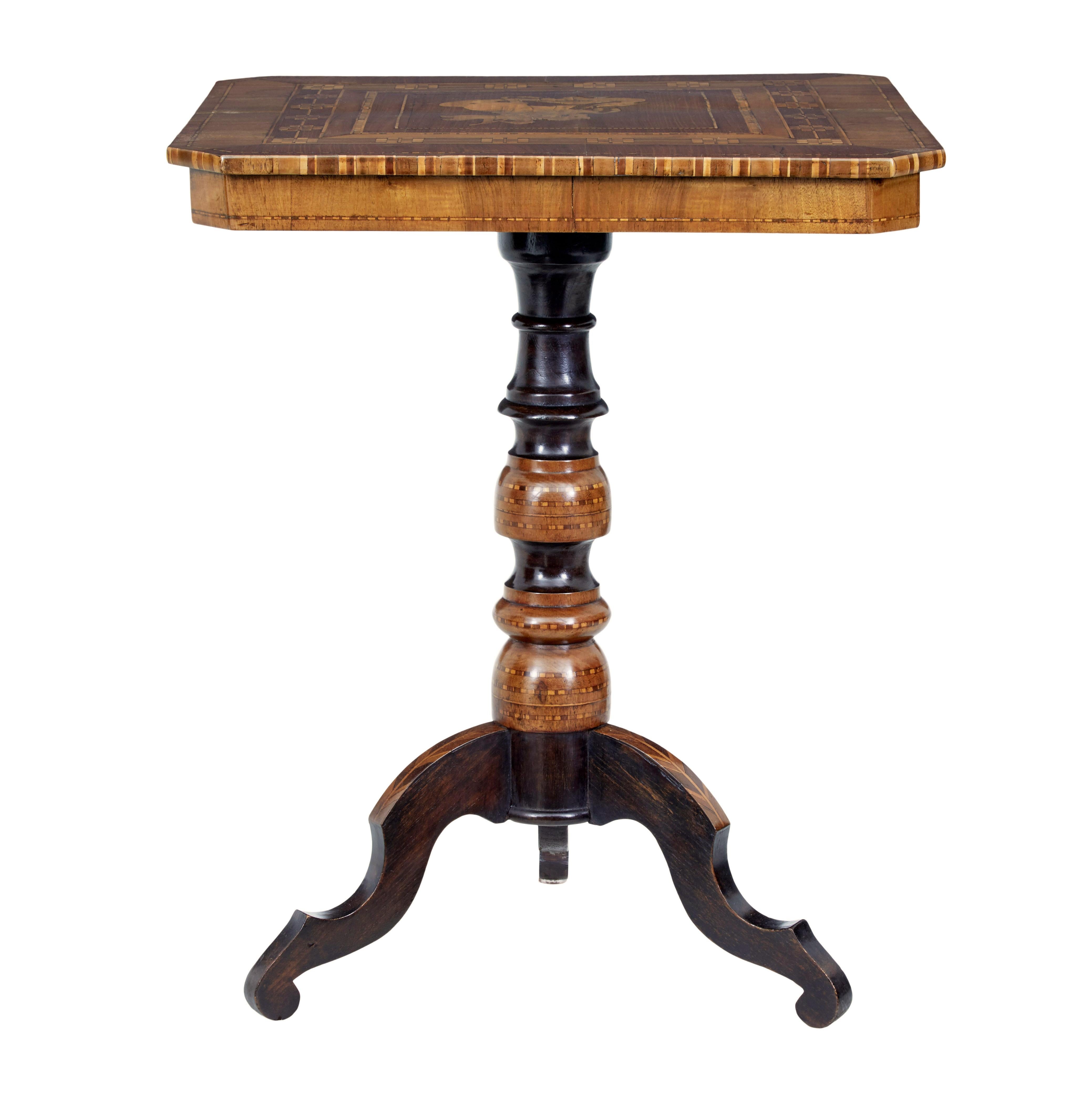 Late 19th century italian walnut sorrento occasional table, circa 1890.

Profusely inlaid italian sorrento table in walnut and olive wood. Square top with canted corners, the top flows with a geometric pattern and depicts george and the dragon in