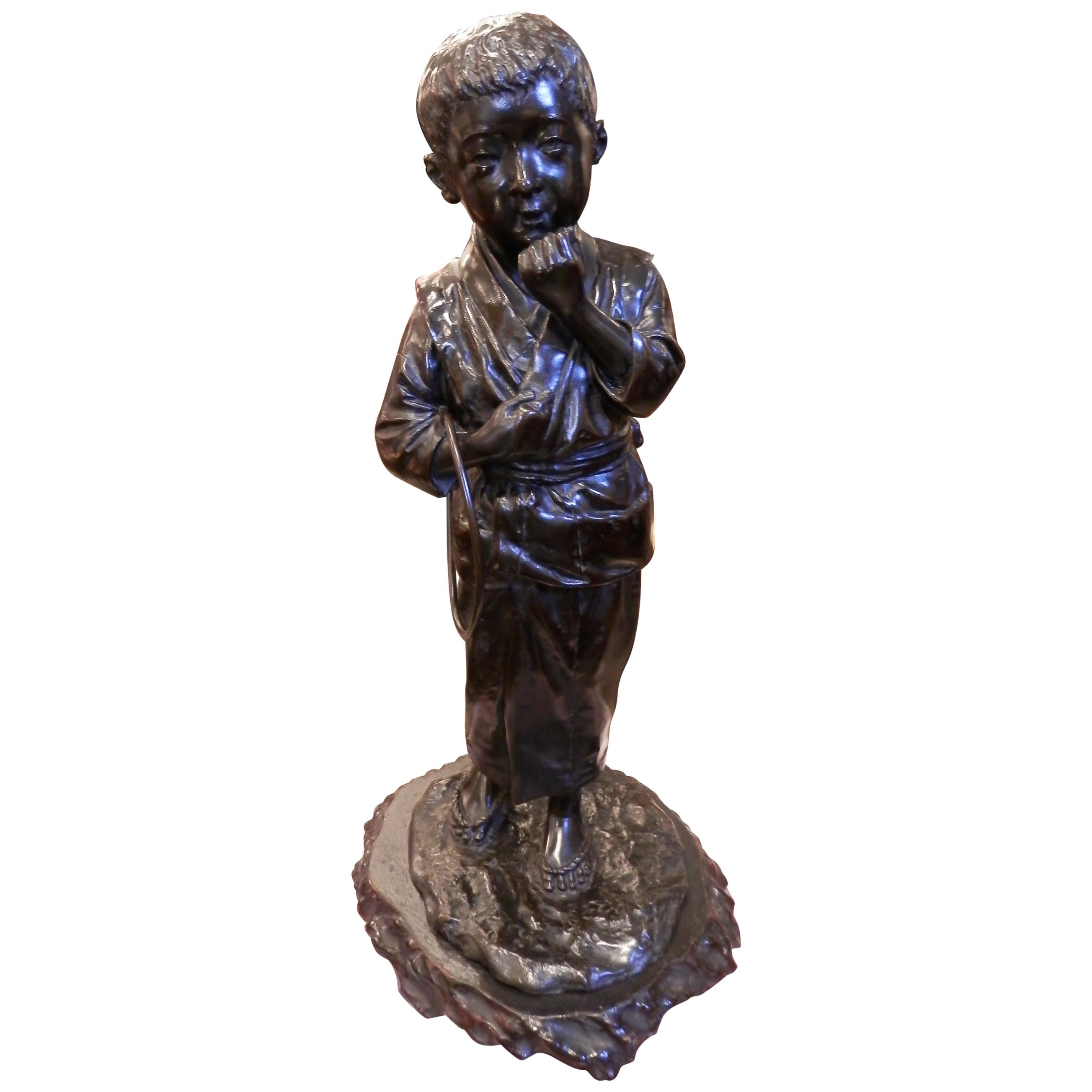 Late 19th Century Japanese Bronze of a Boy in a Kimono on a Naturalistic Base
