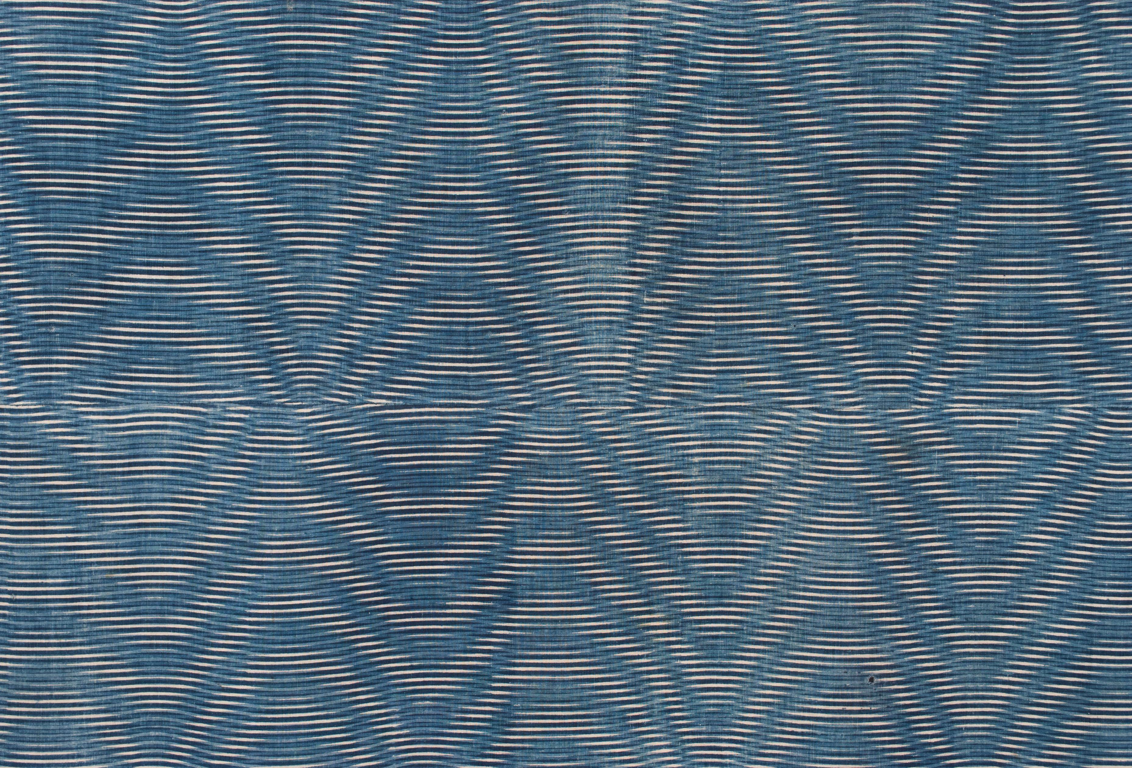 Late 19th Century Japanese Stencil-Dyed Textile / Kumano-zome

This 2-panel cotton textile was made in the Kumano region of Okayama Prefecture in the south of Honshu Island, Japan. It’s unique moire-like pattern is known as ‘Kumano-zome’ (dyed in