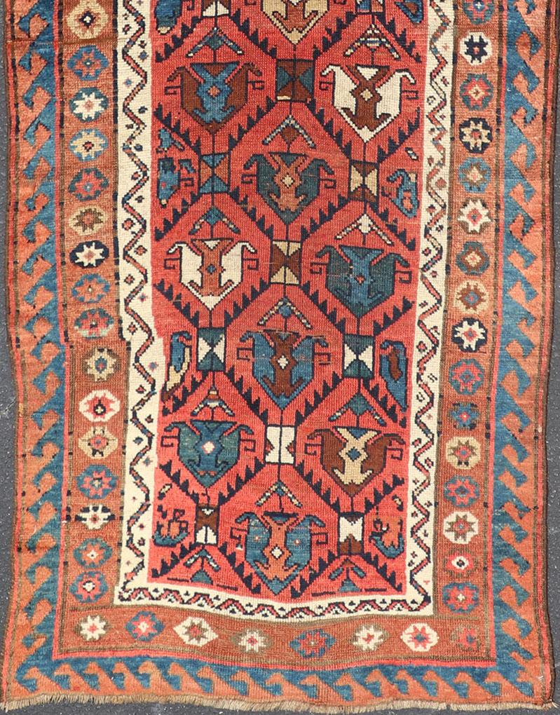 Caucasian Late 19th Century Kazak Runner Featuring All-Over Geometric Tribal Motifs For Sale