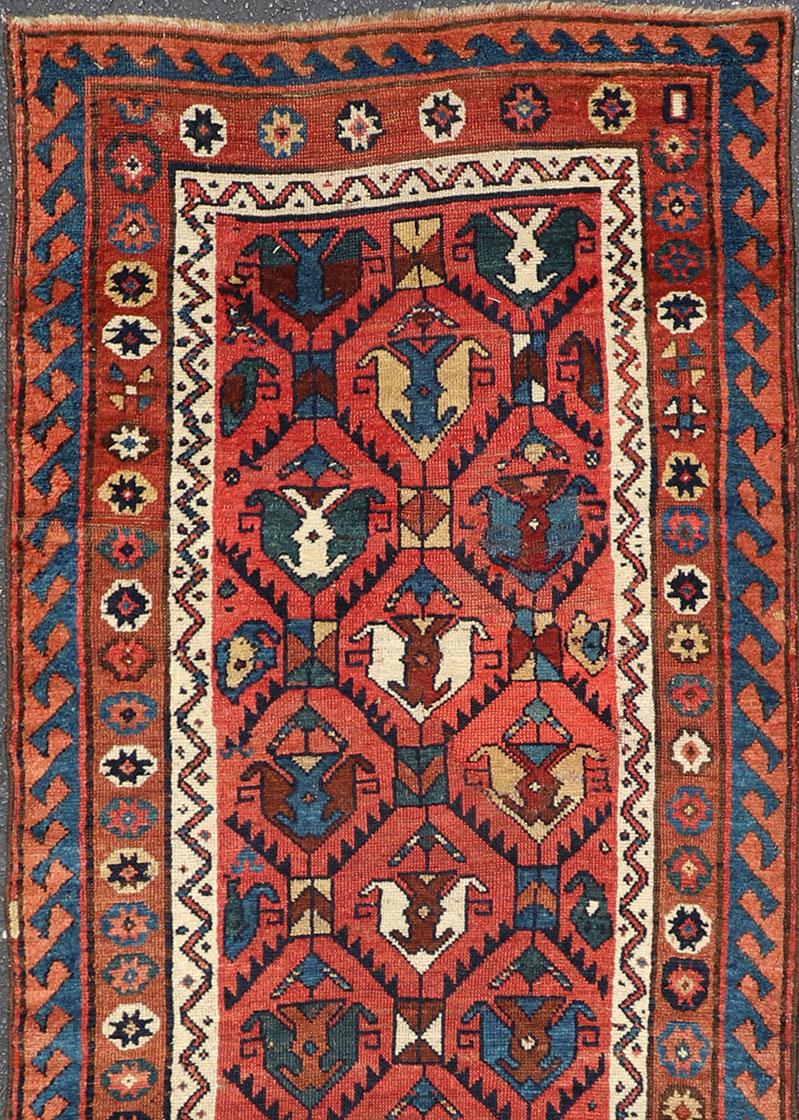 Hand-Knotted Late 19th Century Kazak Runner Featuring All-Over Geometric Tribal Motifs For Sale
