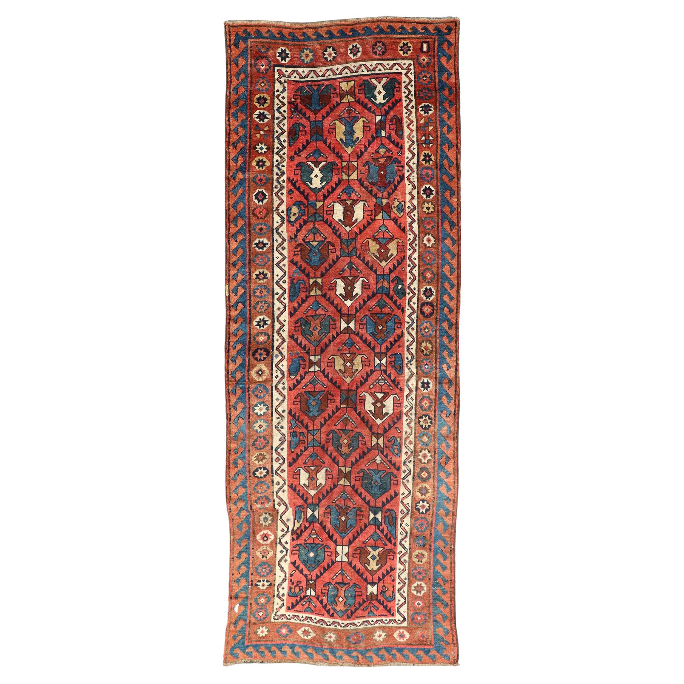 Late 19th Century Kazak Runner Featuring All-Over Geometric Tribal Motifs For Sale