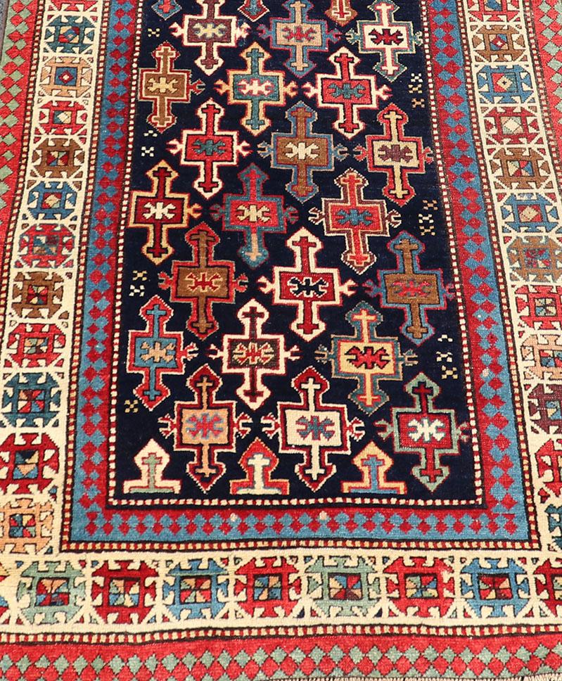 Wool Late 19th Century Kazak Runner with Geometric Design in Tribal Crosses For Sale