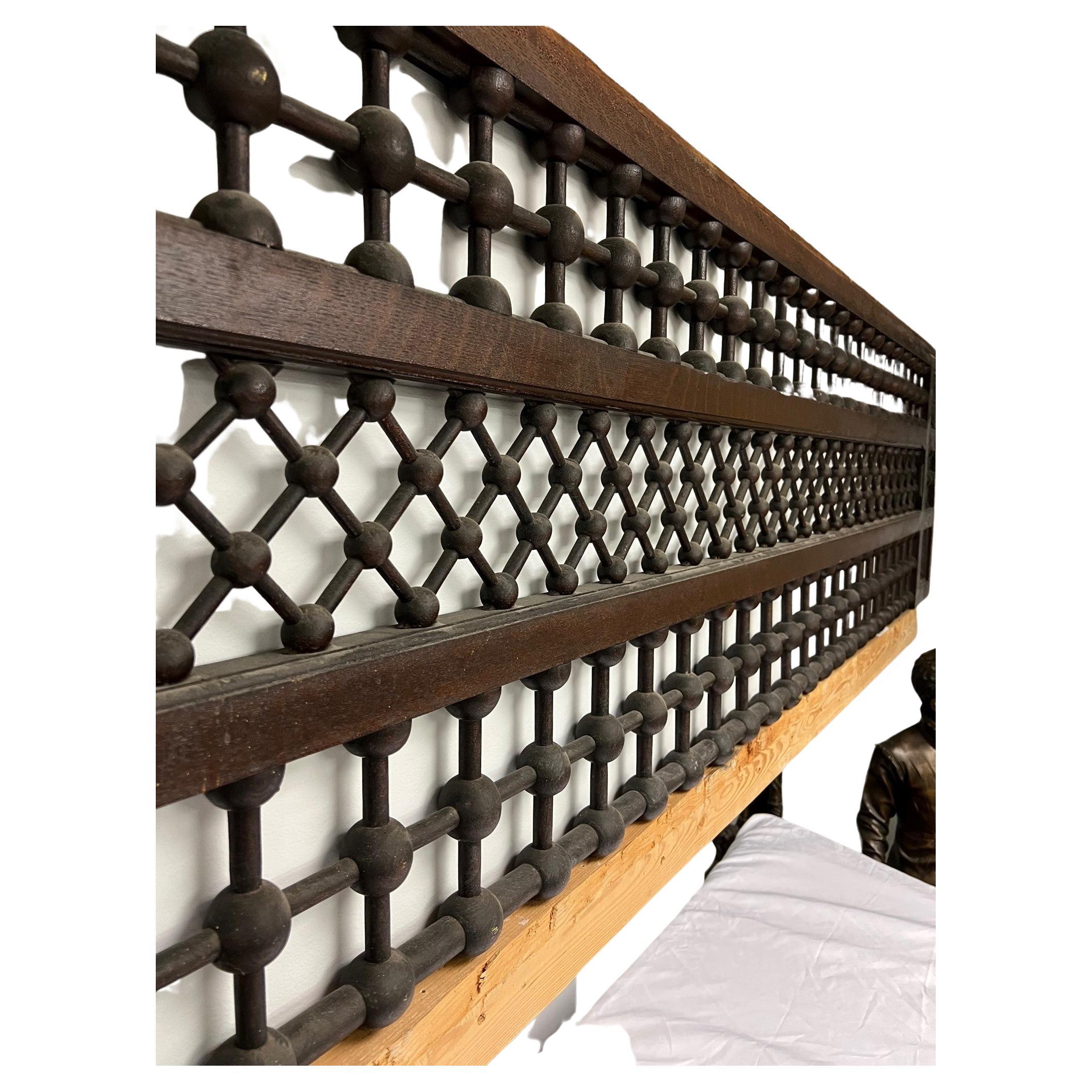 Large Antique Victorian oak fretwork with a diamond and square stick and ball design, with carved wood panels in each corner. Salvaged from a Victorian estate in New Haven Connecticut, where it separated the living room and parlor room. This is not
