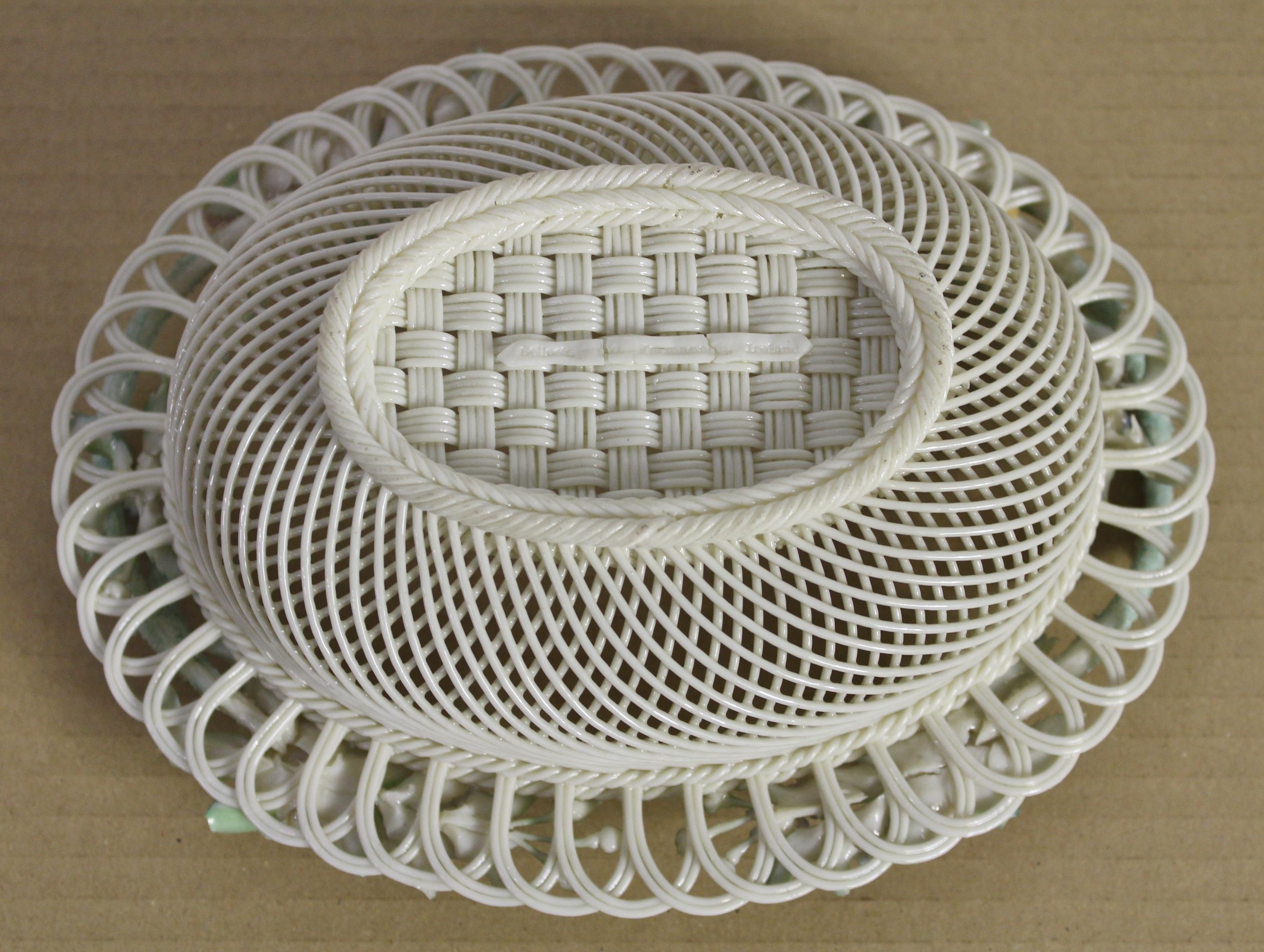 An excellent example of a Belleek open strap-work basket. Dating to second period Belleek, circa 1895. Impressed to the base 