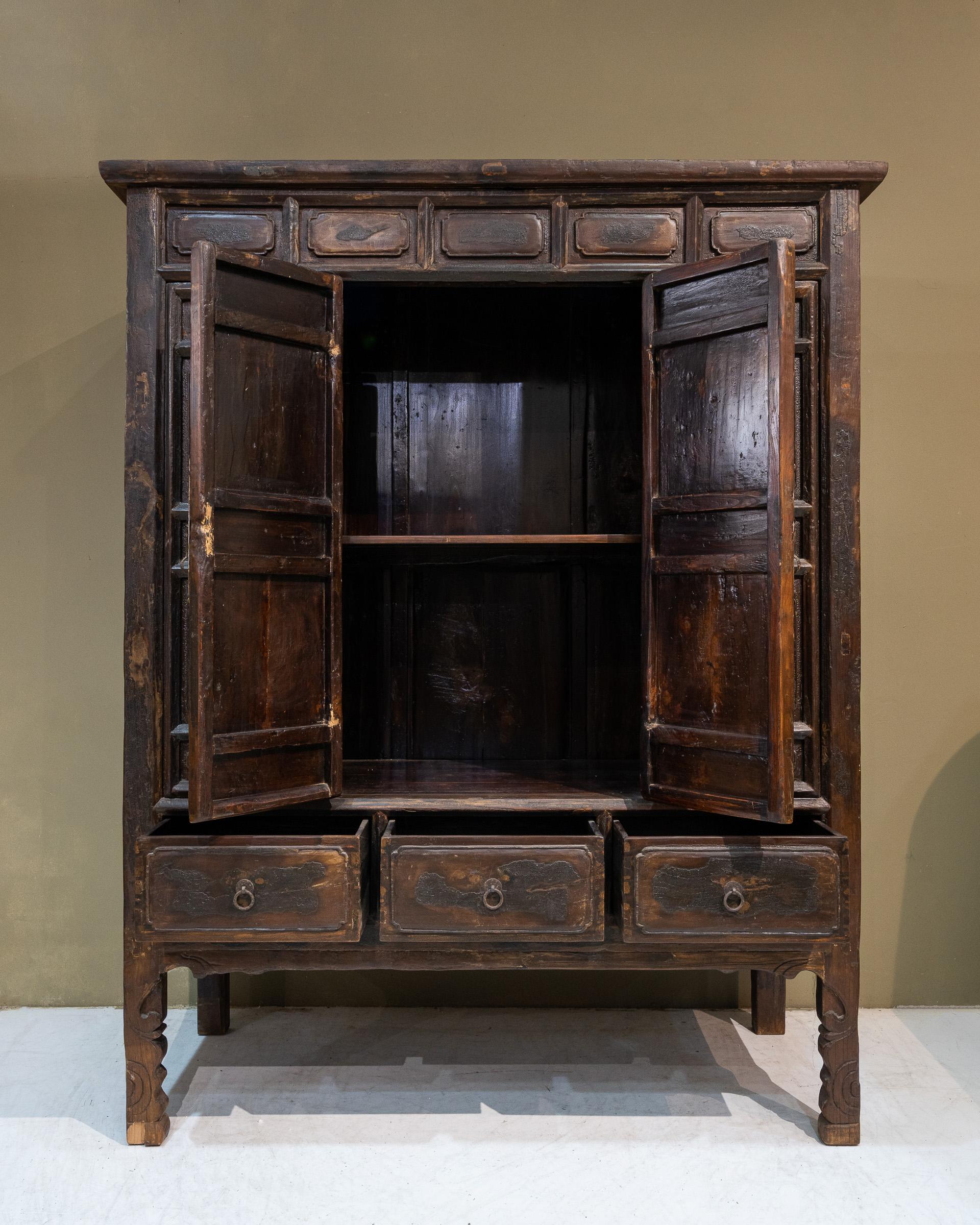 Originally a black lacquer cabinet, but much of the lacquer have peeled off, revealing the lovely wood underneath. Only the middle doors open, the panels on the left and right are secured with wooden pegs inside and they can be removed as well.