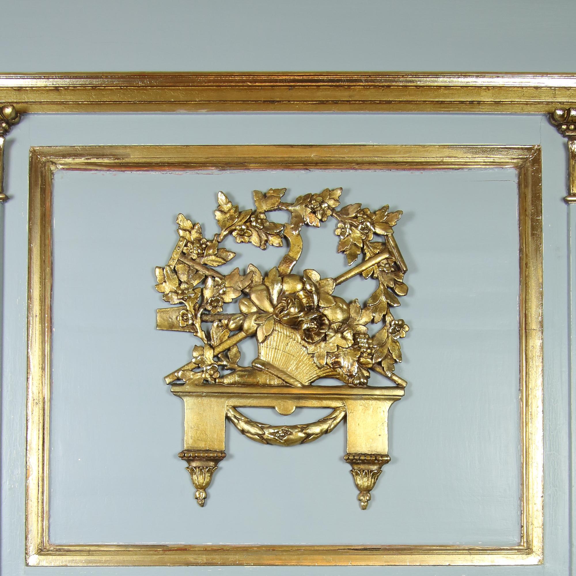 Late 19th century large empire style painted gilt wood wall mirror or trumeau

Large rectangular mirror with architectural structure: the central field, consisting of a lower mirror field and upper decorative cartouche, is flanked by a pair of