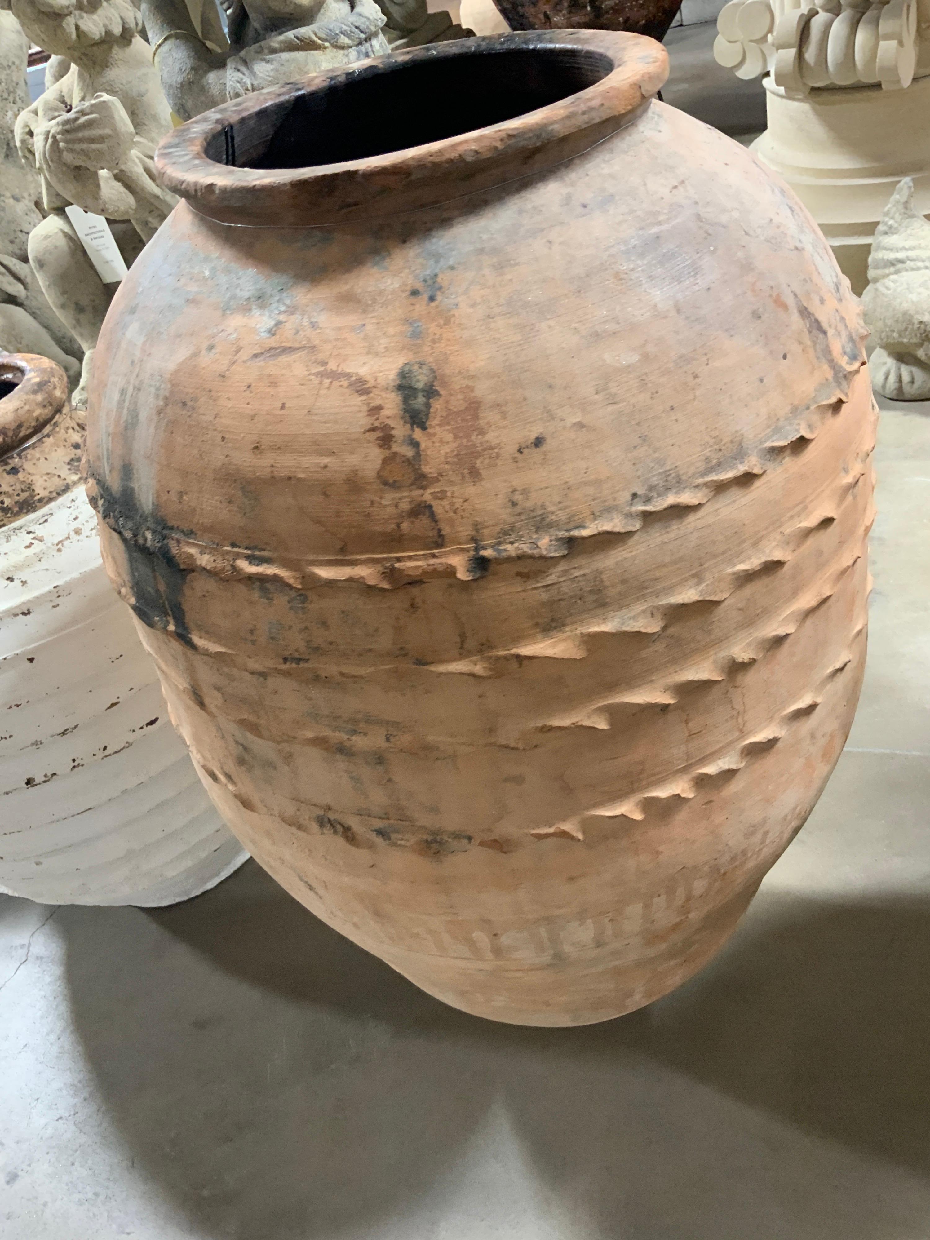 Beautiful large vessel, originates from Greece. Item dates back to 1890s.