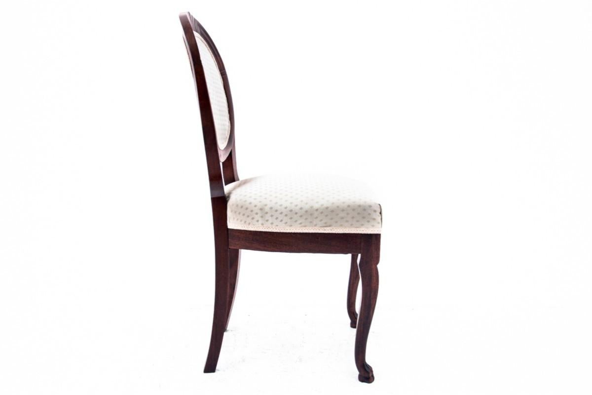 Late 19th Century Late 19th century lion's paw table with chairs, Northern Europe.