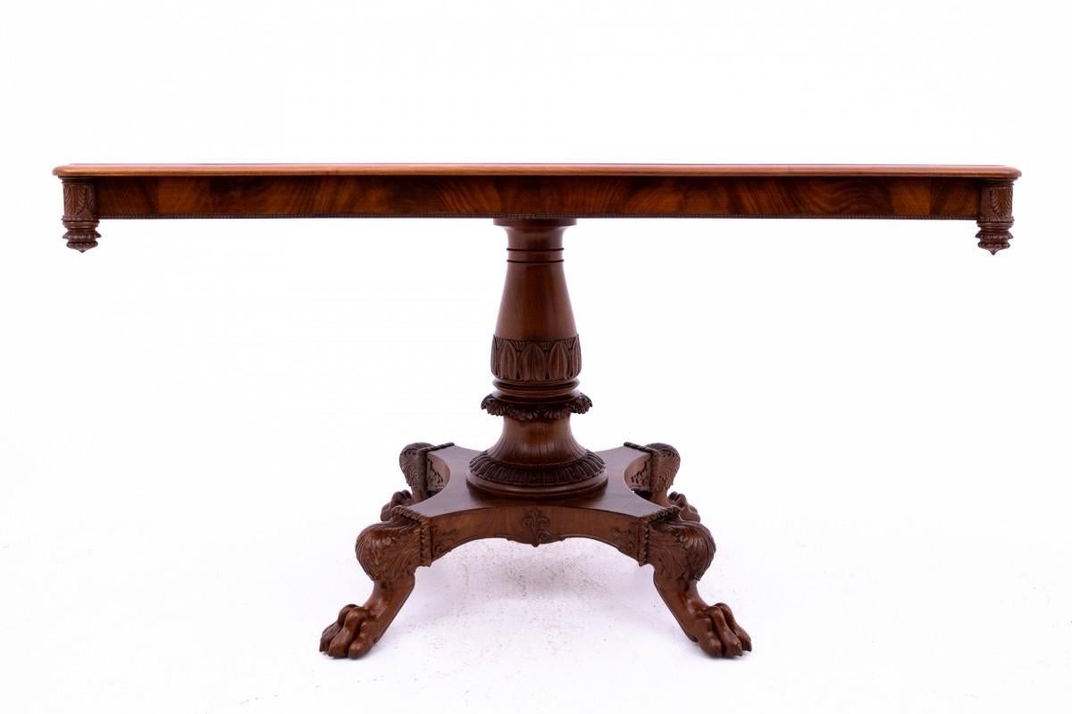 Wood Late 19th century lion's paw table with chairs, Northern Europe.