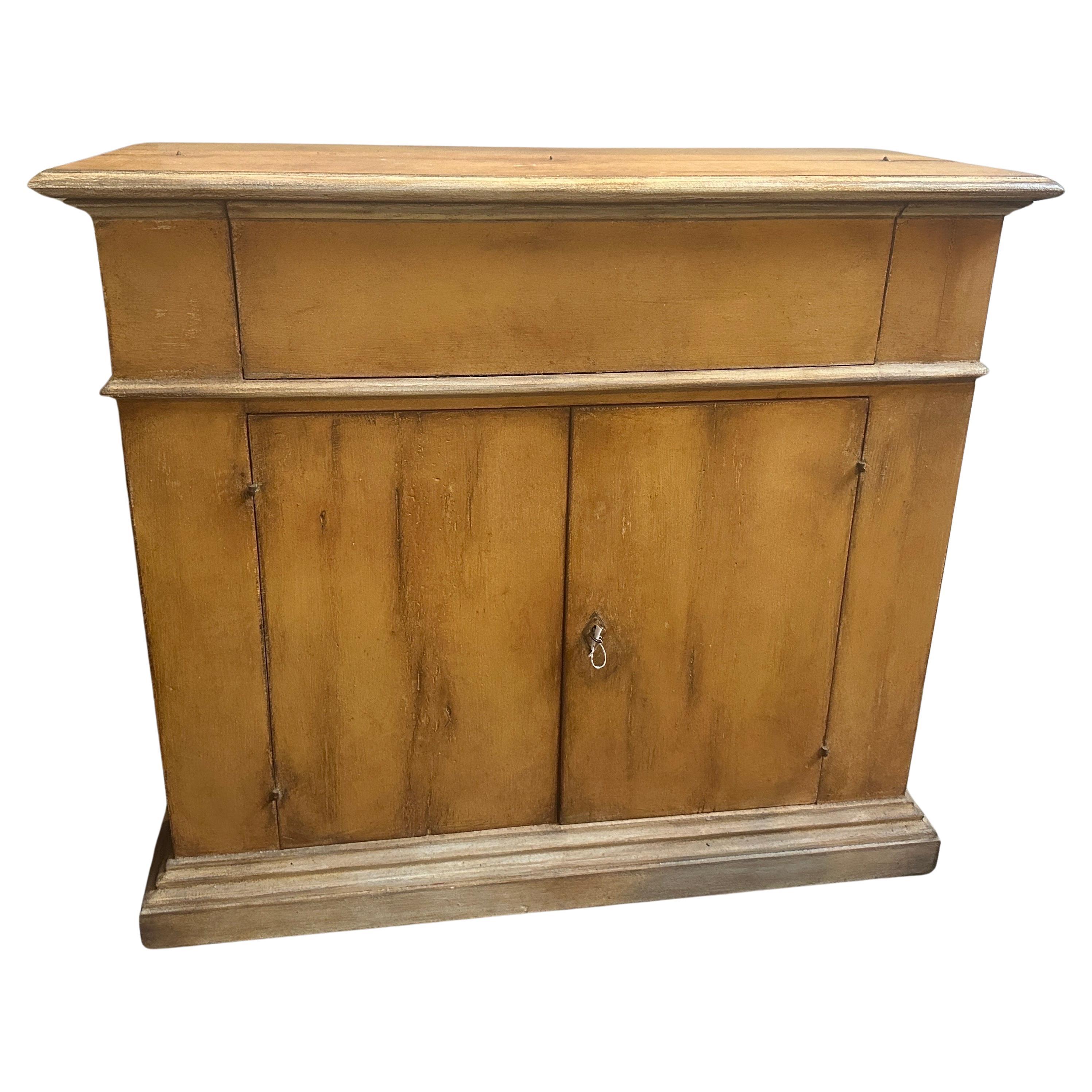 This Orange and brown Lacquered Italian Secretaire serves as both a functional and aesthetically pleasing piece, showcasing the design sensibilities of its era with a bold and distinctive color choice. It's in good conditions with normal signs of