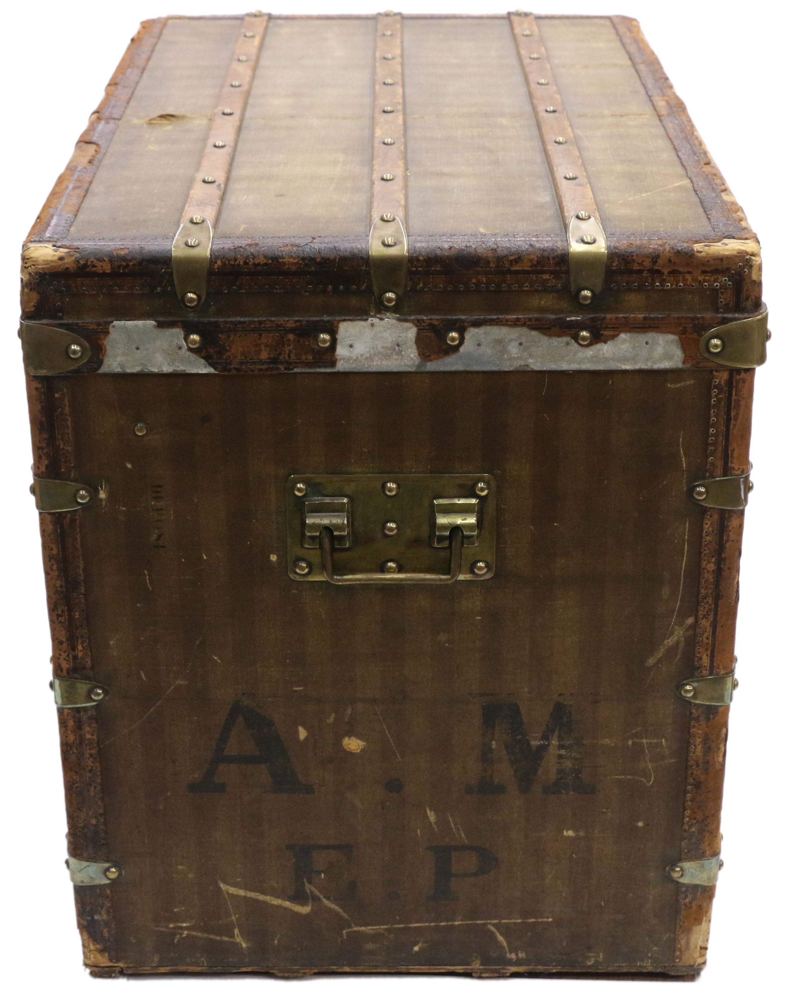 Late 19th century Louis Vuitton striped canvas steamer trunk with multiple storage compartments. Not only is this late 19th century Louis Vuitton steamer trunk a functional piece of storage, it is also the perfect decorative accessory whether it's