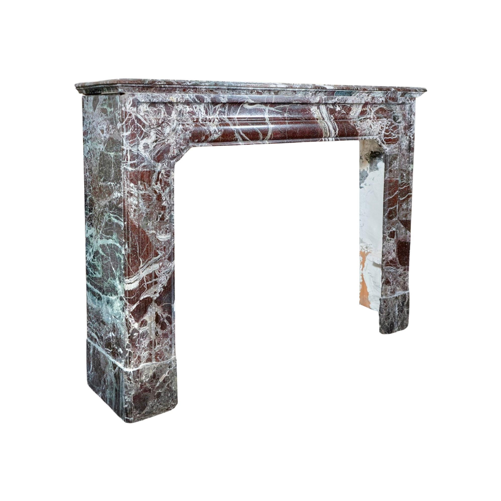 This French Red Levanto Marble Mantel is an exquisite piece of craftsmanship from 1870s France. With its bolection style carvings, it adds a touch of elegance to any room. Made from premium quality Red Levanto Marble, it is sure to impress with its