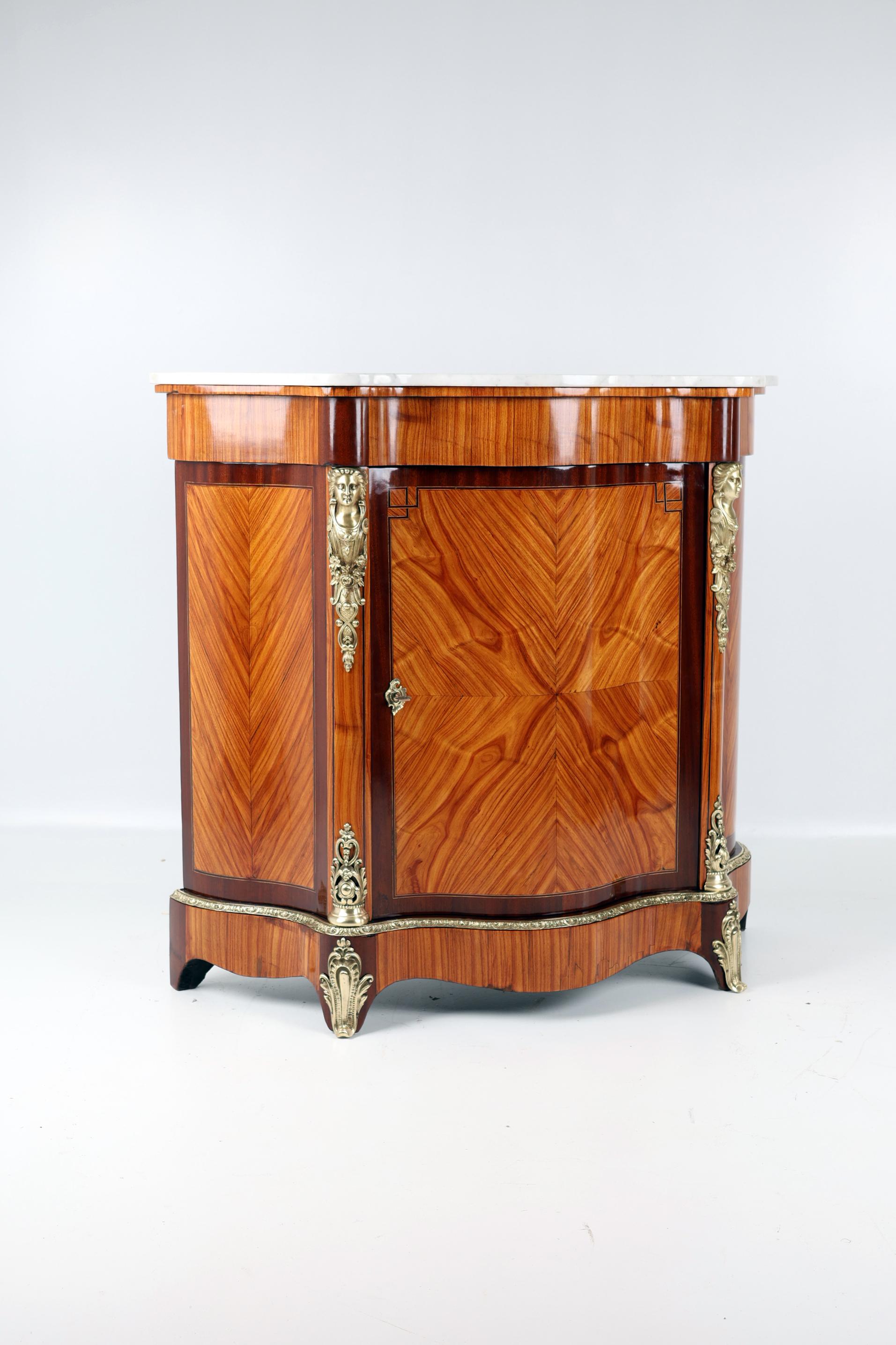Late 19th Century Louis XVI Style Buffet with marble on top,
Cherrywood, 
France, Ca 1890

This antique Louis XVI buffet dates from the end of 19th century, represents the refinement of French design. Its marble top gives it a unique character,