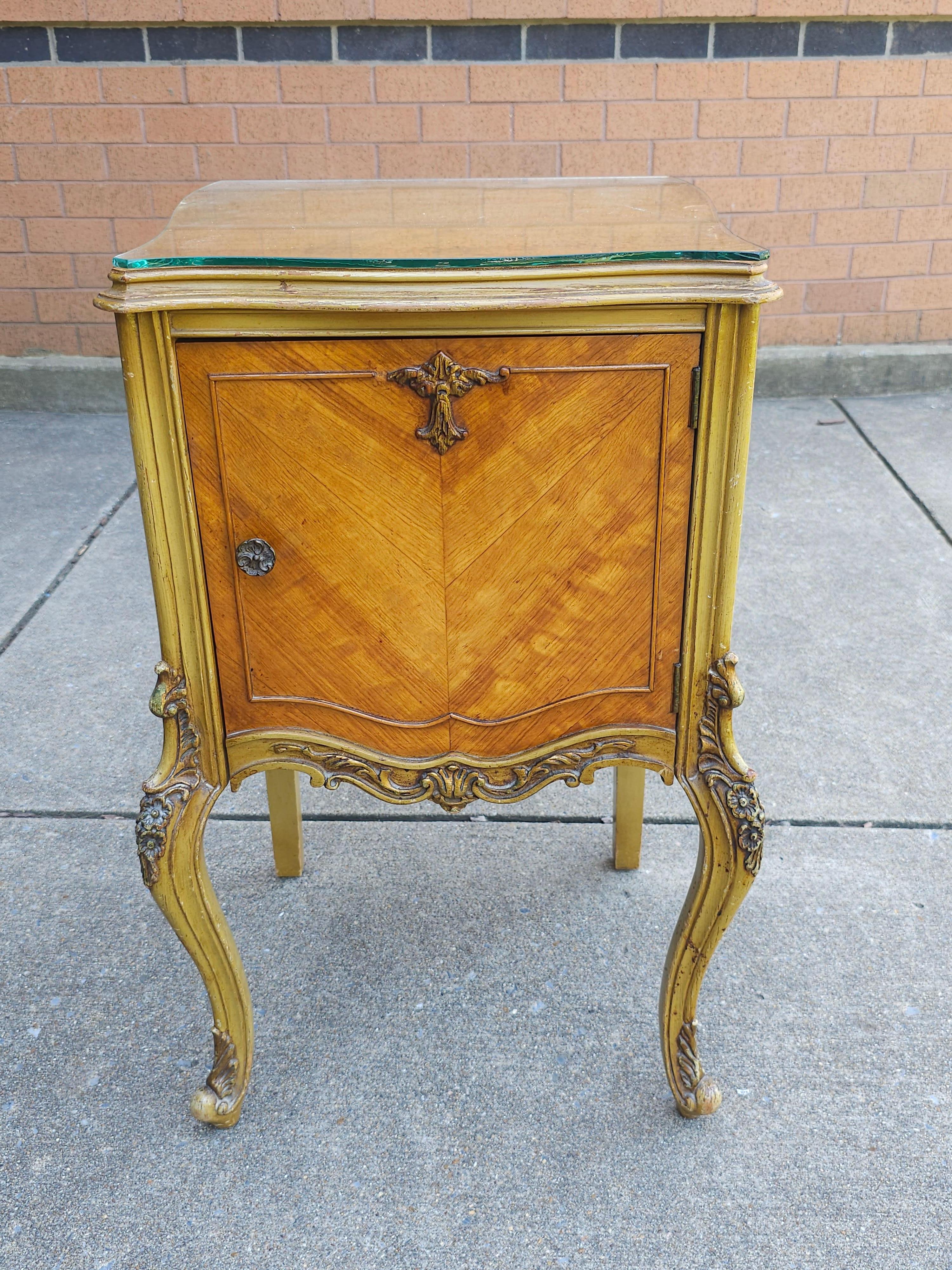 A Late 19th Century Louis XVI Style Provincial Walnut Bedside Cabinet with protective Glass Top. Measures 18.5