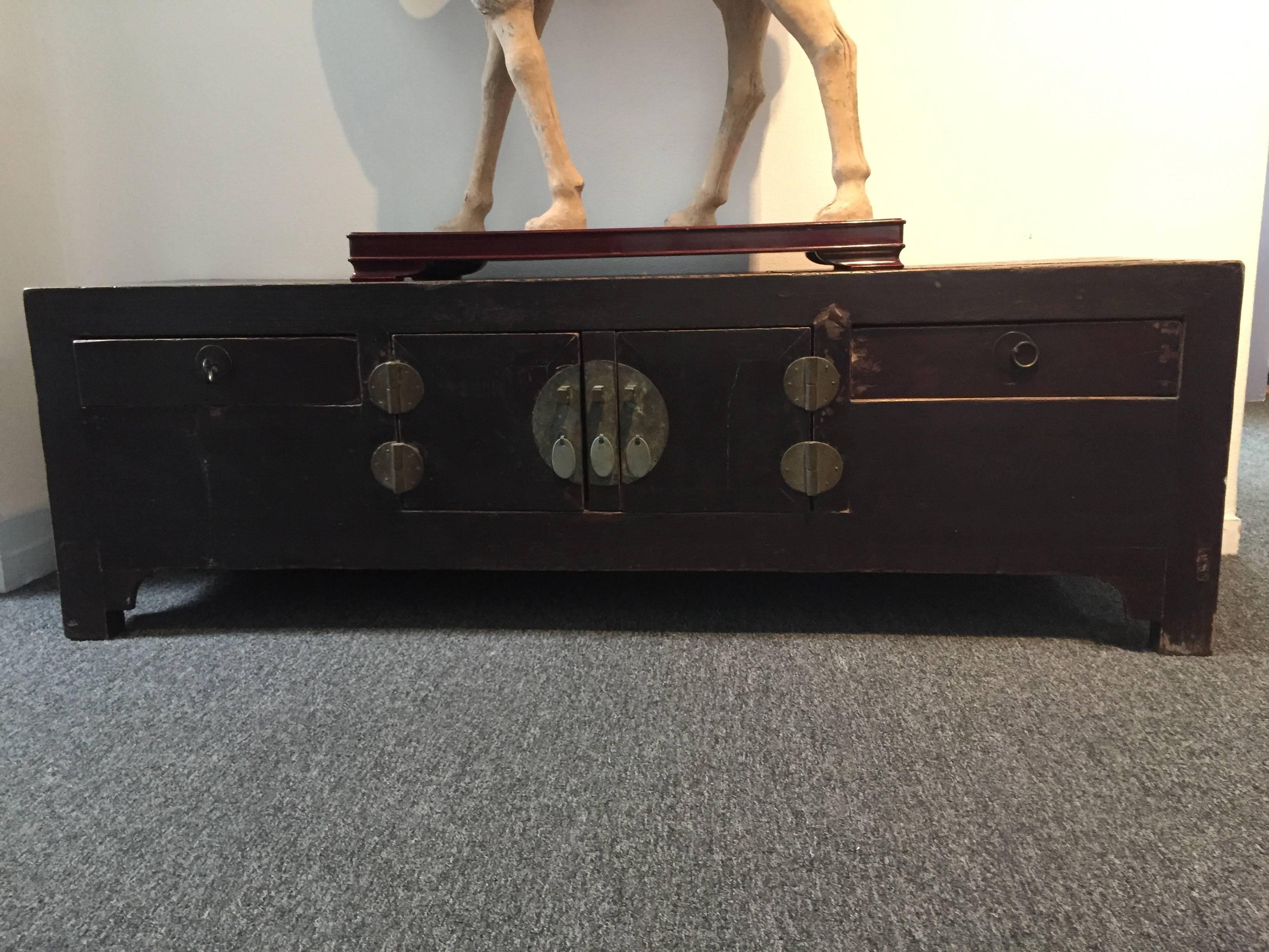 Late 19th or early 20th century low standing alter table.
With two sliding doors and two center doors that open out.
Original hardware.
Good for storage and display purposes.
*item is on sale, and will expire at end of Aug.
Offered by J R