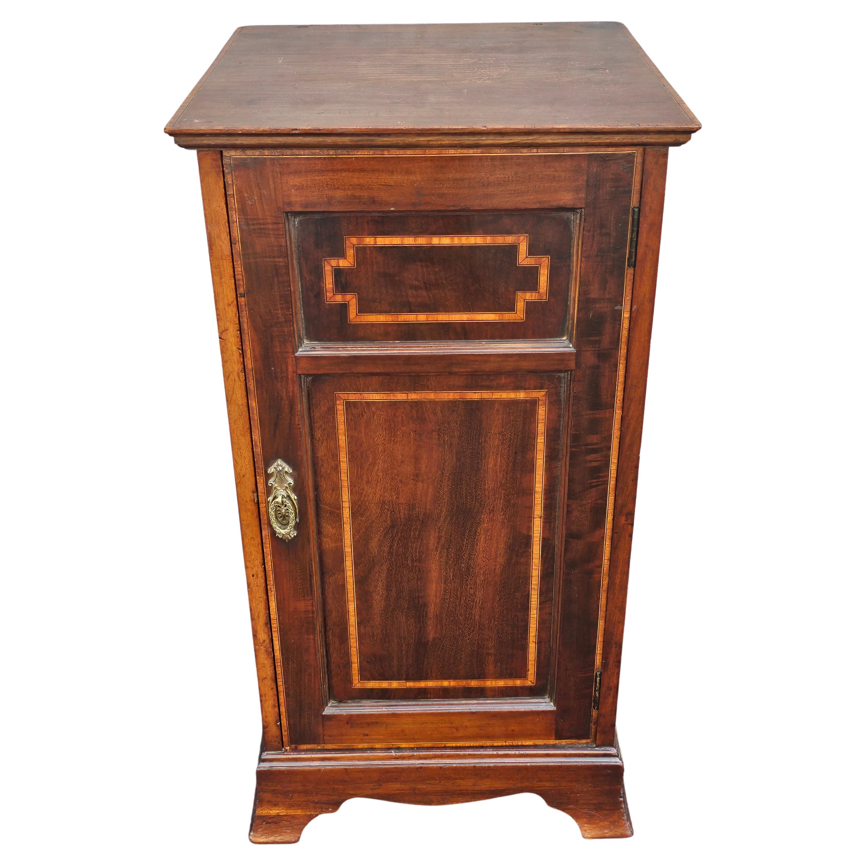 An exquisite late 19th Century Mahogany and Satinwood Inlay Cabinet and Stand with pine wood backing. Measures  16