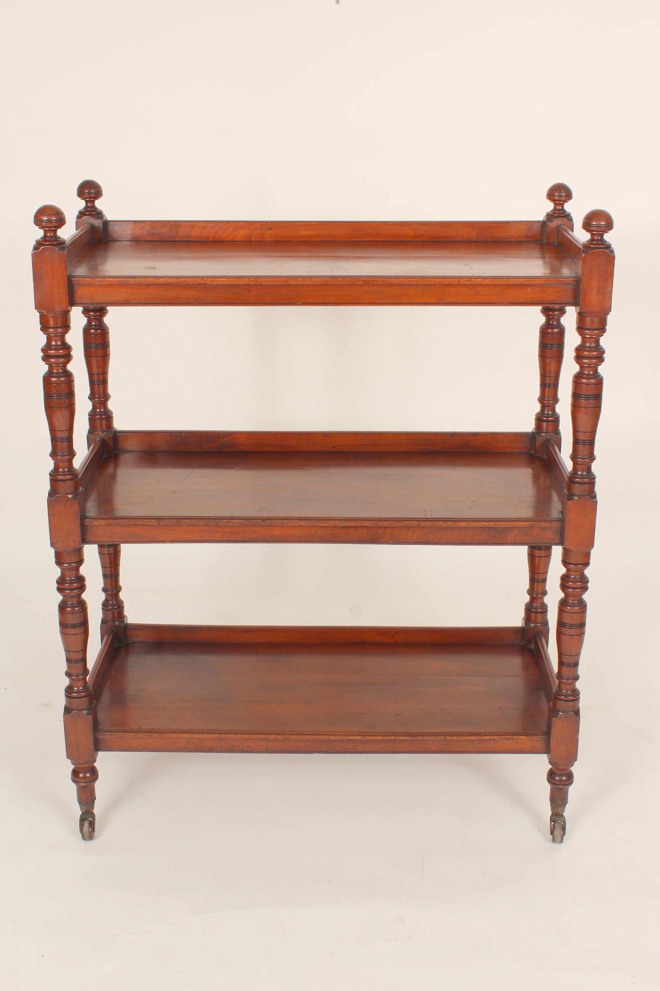 Edwardian mahogany three tier étagère with nice patina, circa 1890-1910. Versatile piece that can be used for display, serving or as a bookcase.