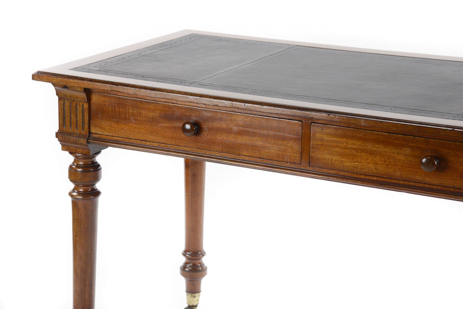 A late 19th century mahogany leather top writing table, signed Gillows and L 2409 indicating a manufacturing date of 1874

Gillows of Lancaster and London, also known as Gillow & Co., was an English furniture making firm based in Lancaster,