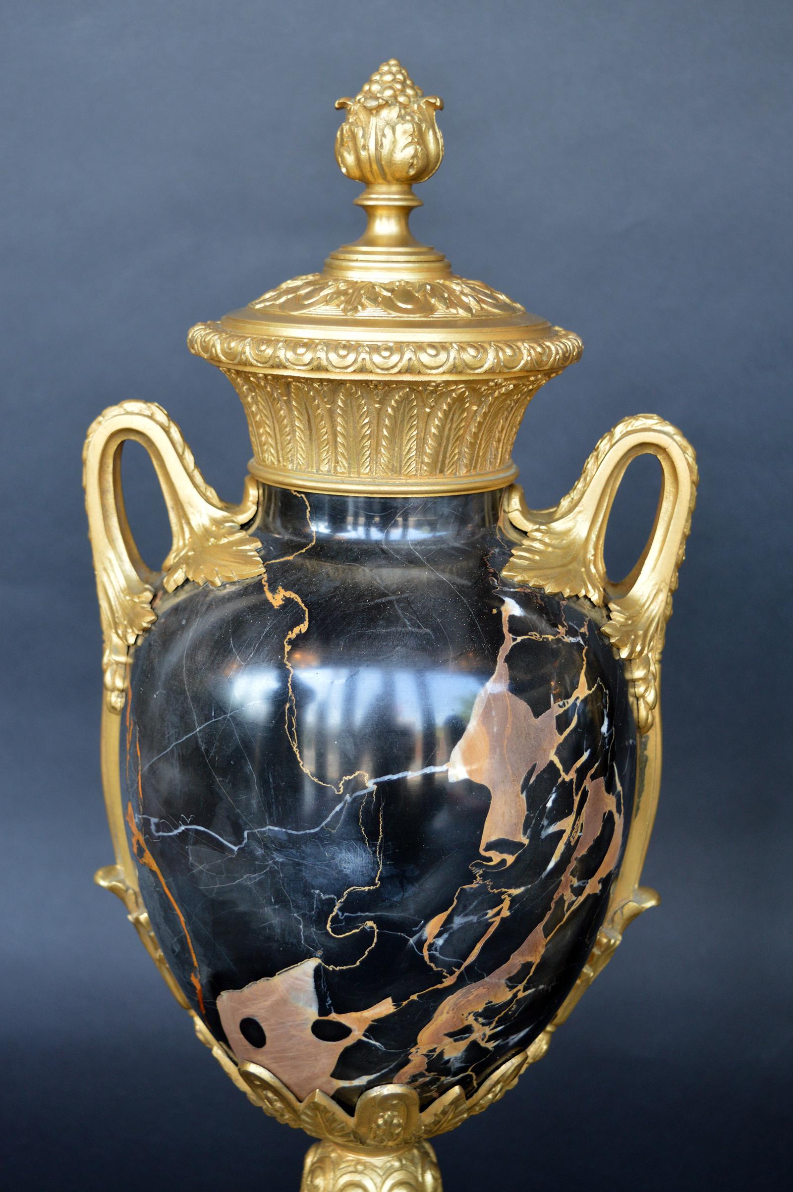 Gold and black marble set in bronze. Italian.