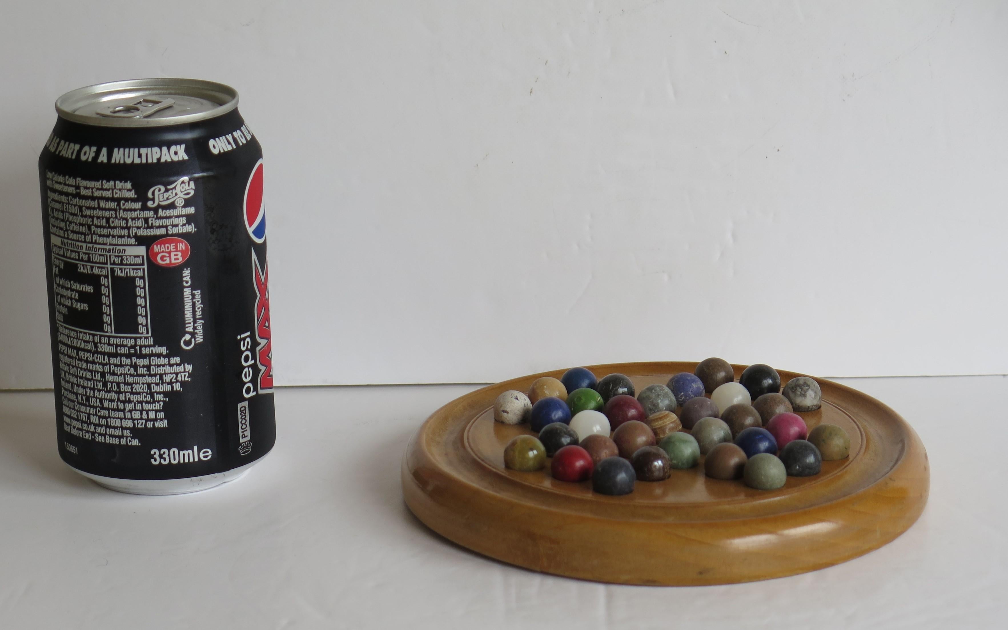 Late 19th Century Marble Solitaire Board Game with 33 Handmade Marbles, Ca 1900 1