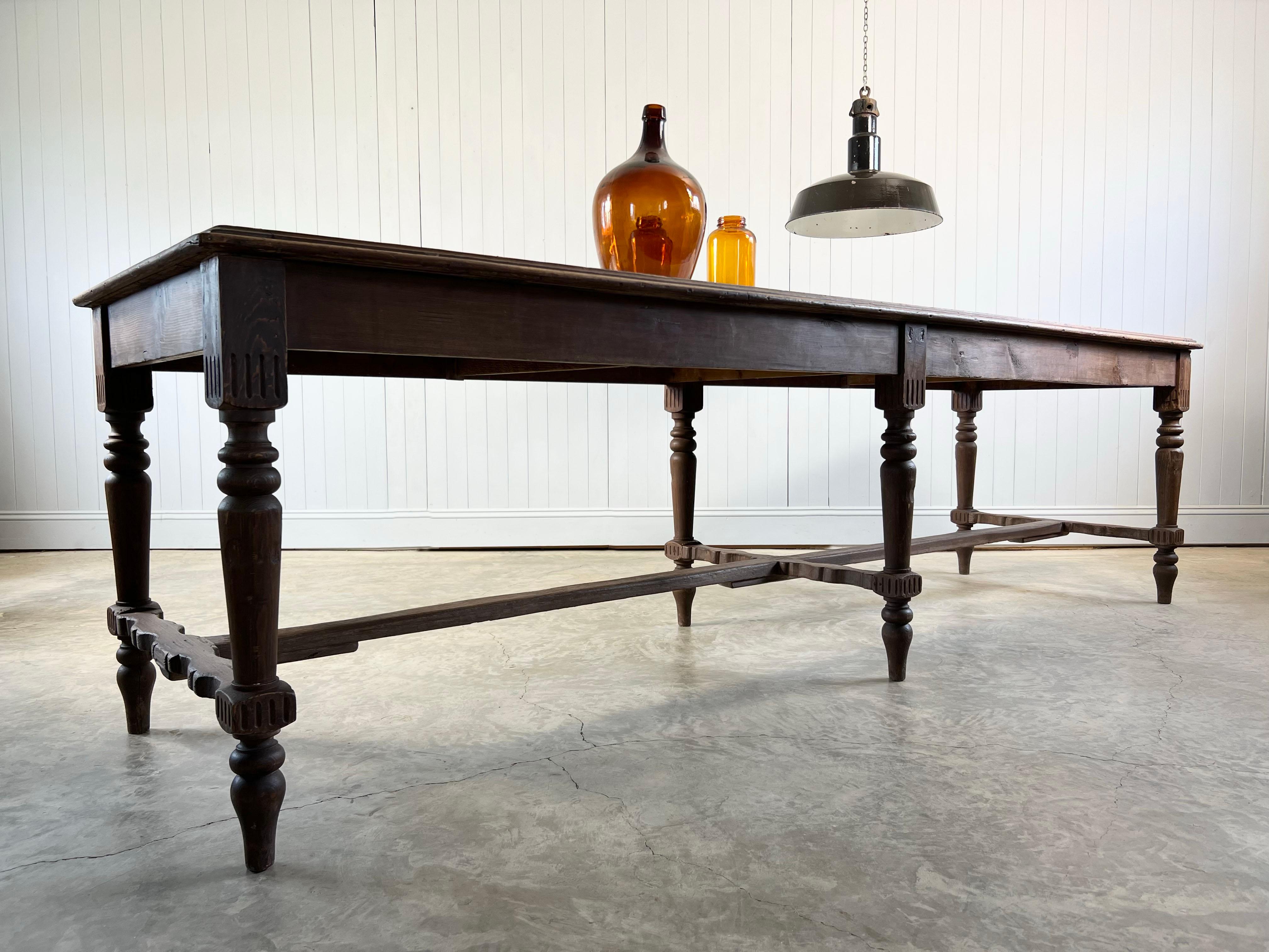 Late 19th Century this French table would have been used for displaying delicious pastries and breads.  

Lovely proportions and contrasting materials with the marble insert and the naturally worn pine frame of this large table.

The marble, which
