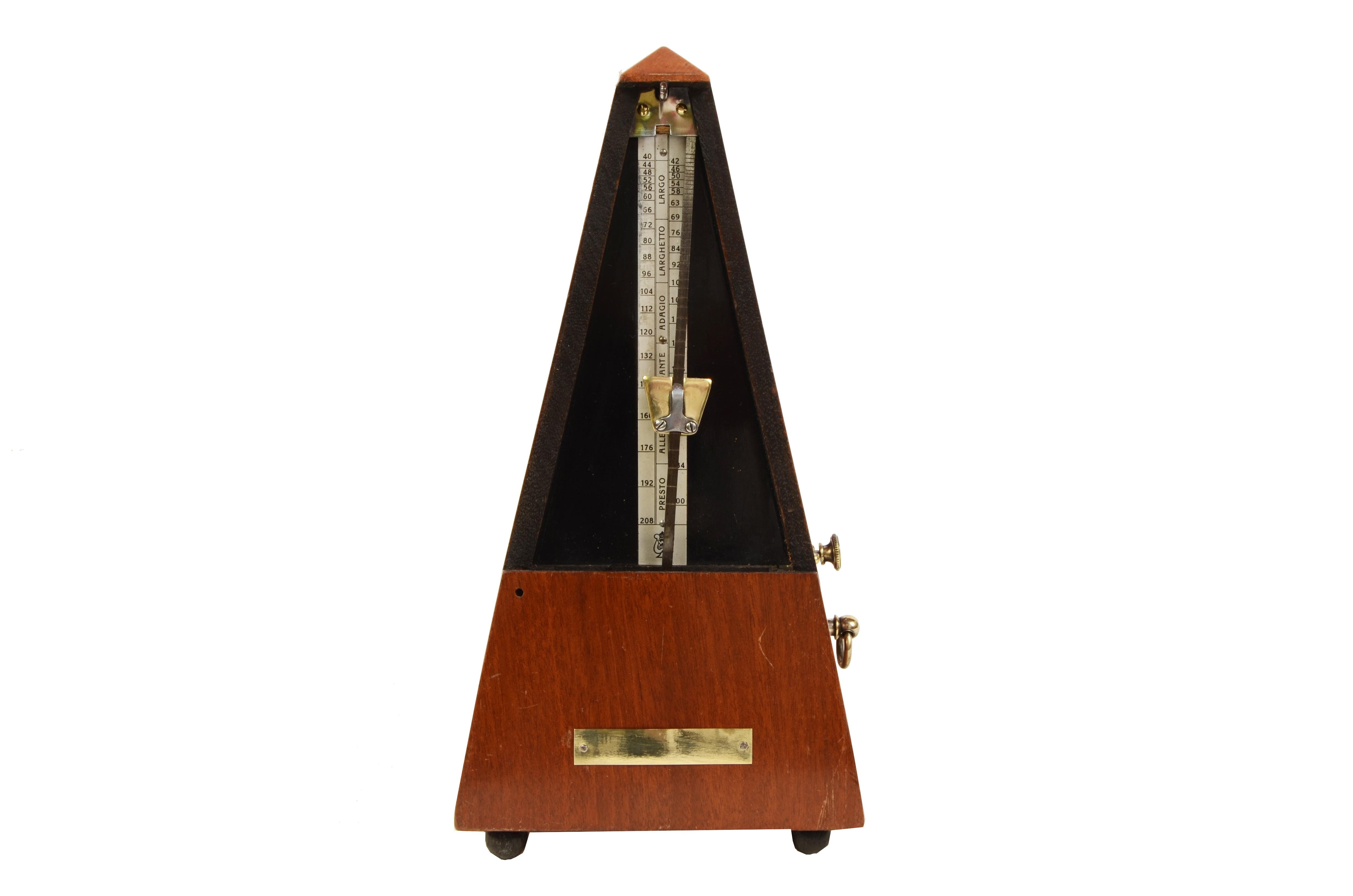 Metronome system Johan Maelzel (1772-1838) from the late 19th century. It is an instrument used to measure the Tempo of music, the sound of the pendulum indicates the exact speed of execution. 
The instrument consists of a pendulum with a