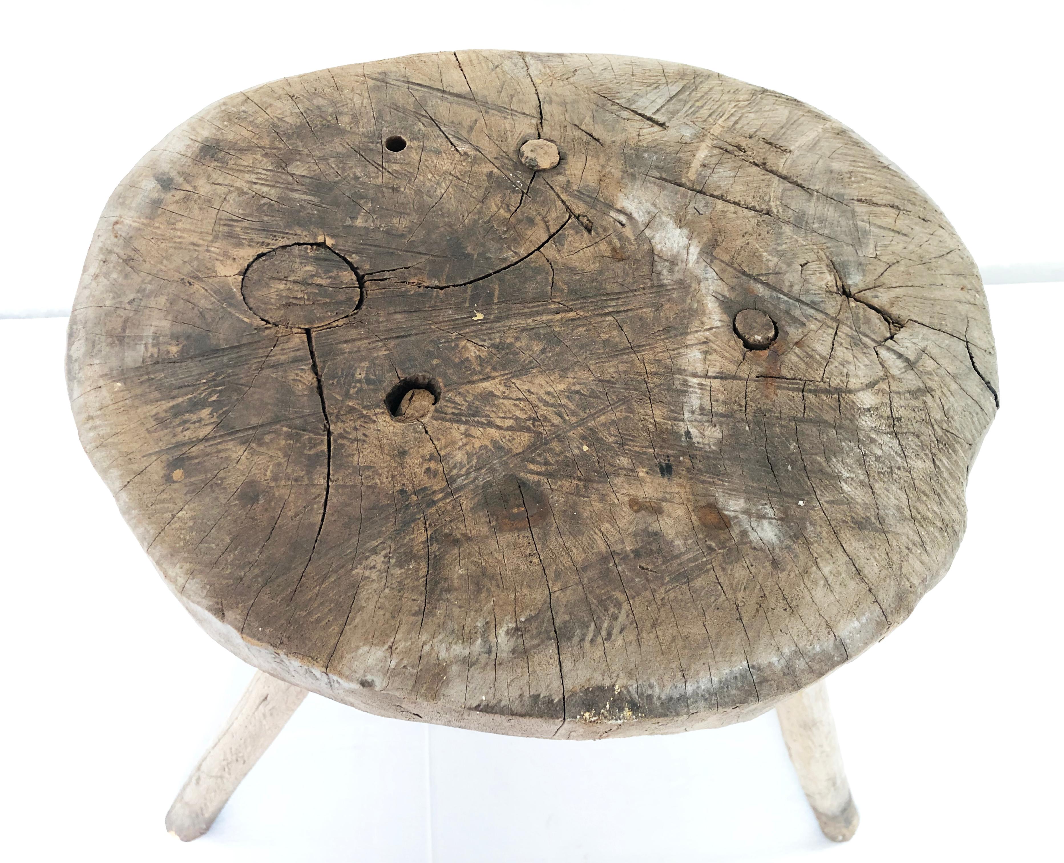 Antique natural mezquite milking stool wood stool with thick round top found in Western Mexico.
Great for side table or next to a tub.