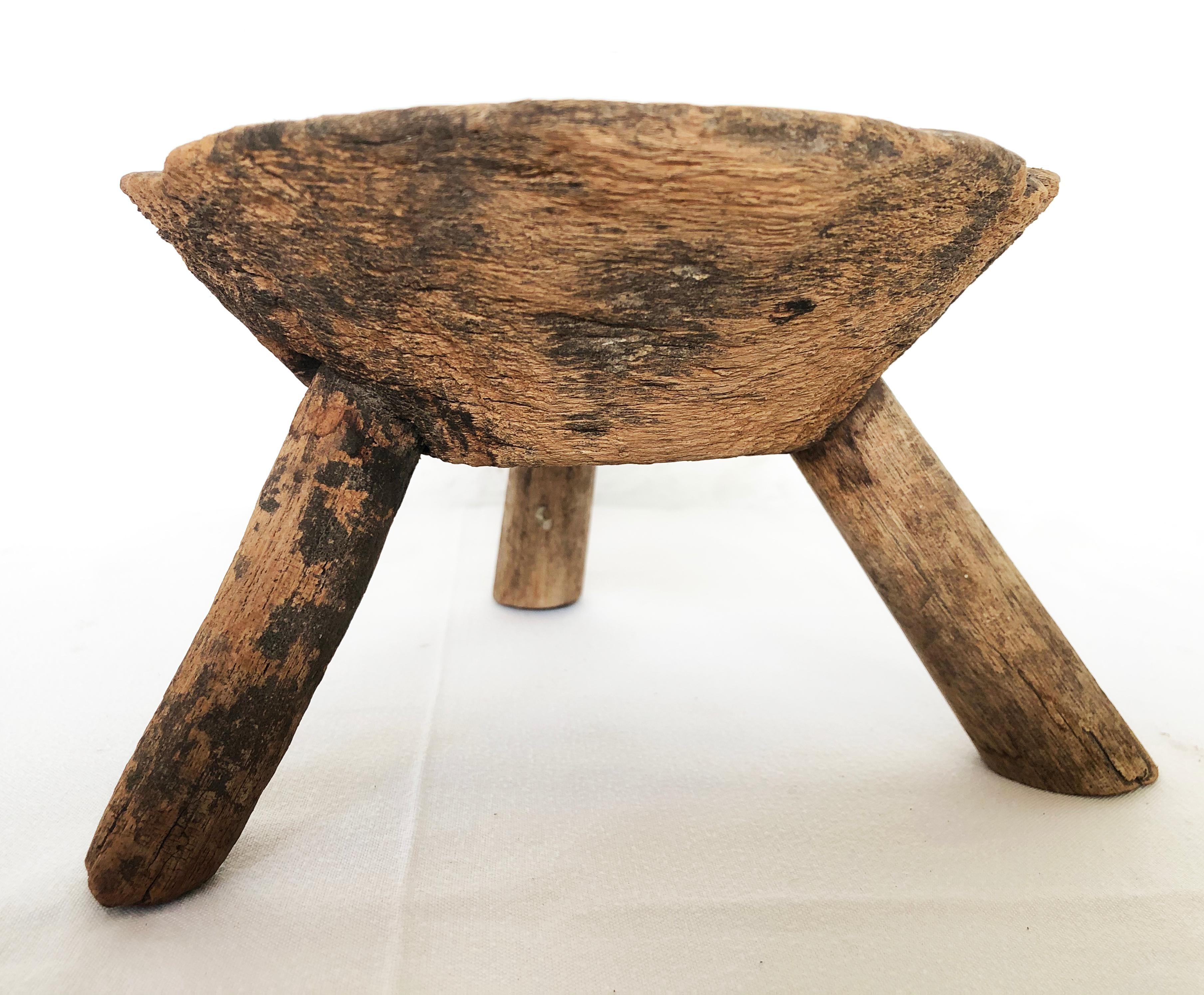 Antique natural mezquite minimilking stool wood stool with thick round top found in Western Mexico.
 